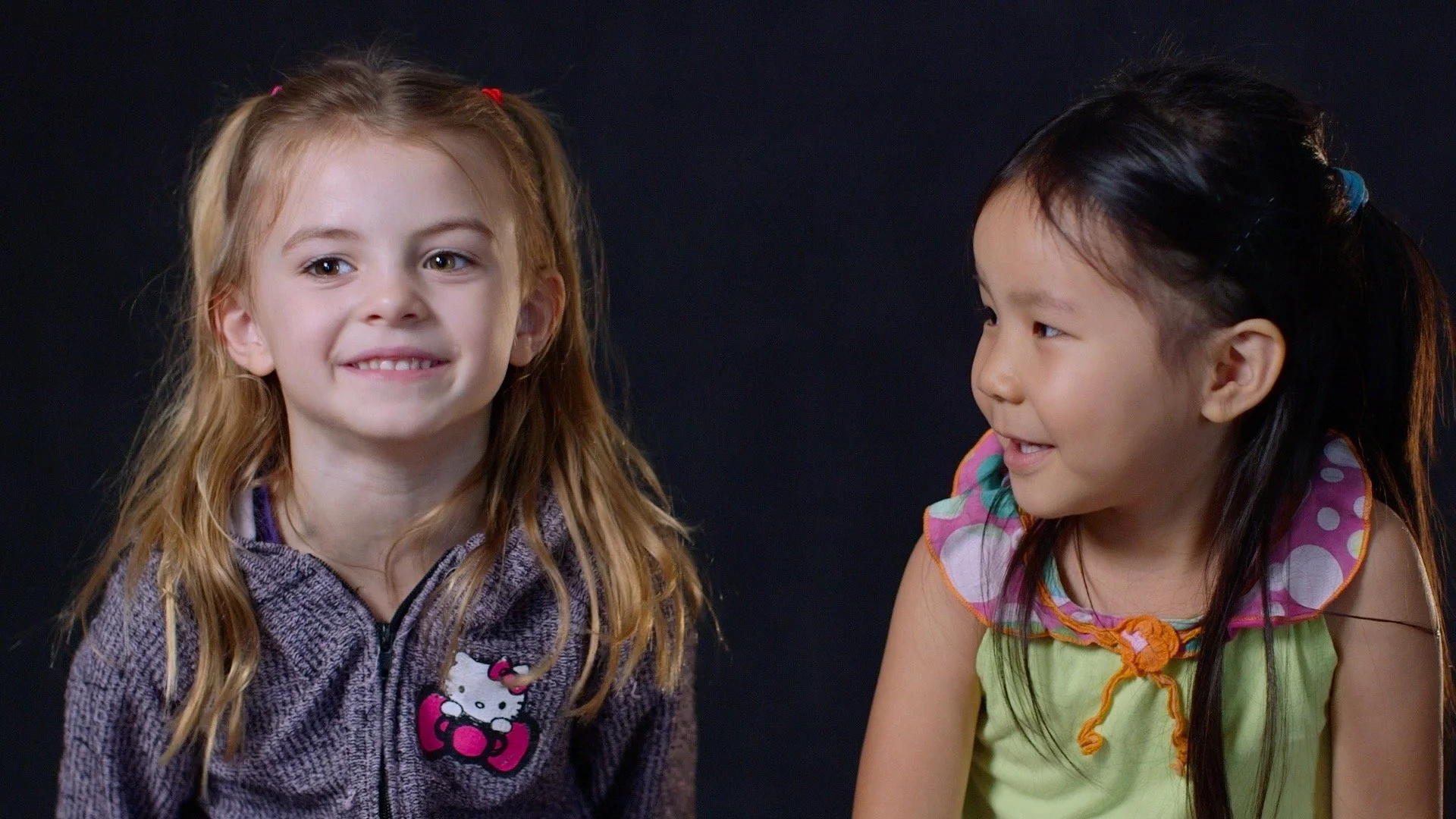 Two elementary students talking together during an interview
