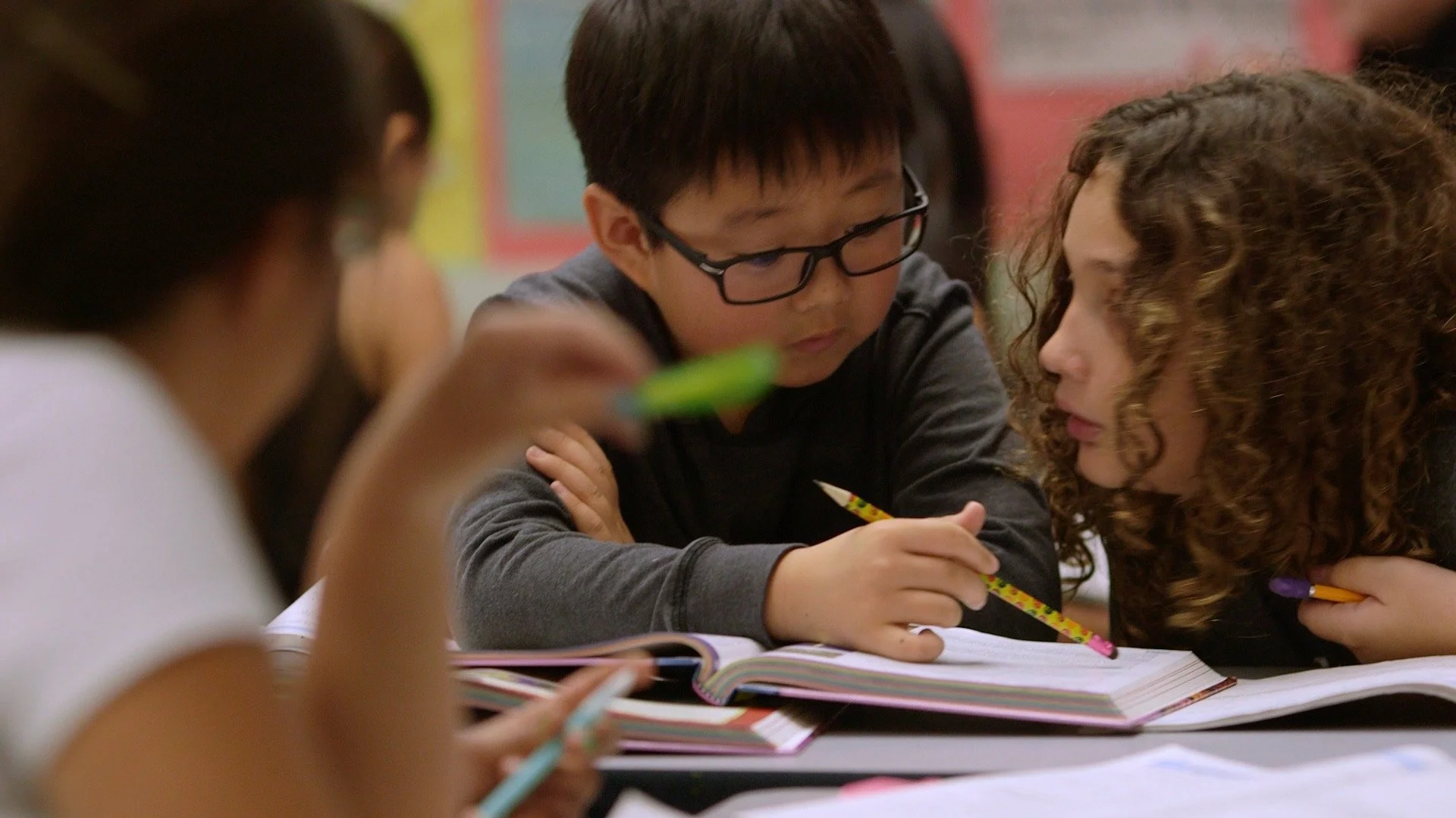 Student working together on a classroom activity