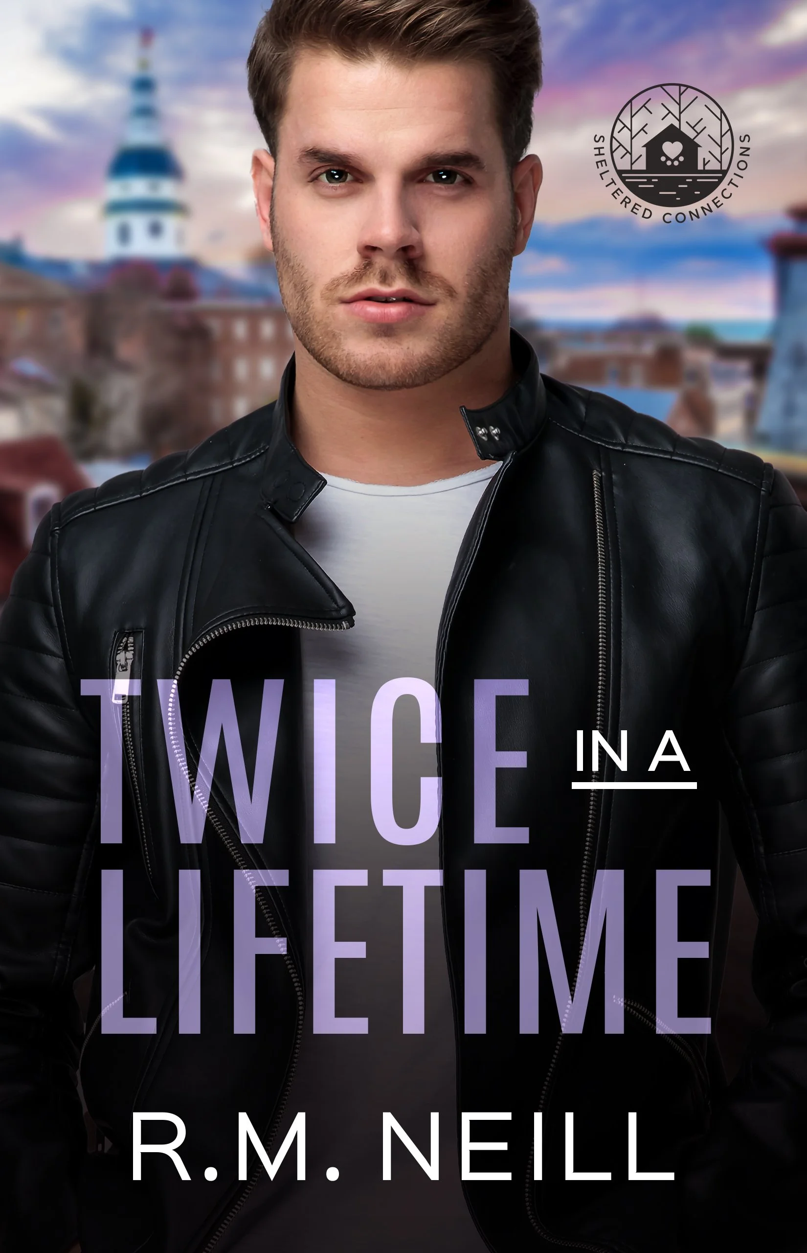 Close-up of a young man with brown hair and beard, wearing a black leather jacket and white shirt, standing outdoors during sunset with a blurred cityscape and sky in the background. Overlaid text reads 'TWICE IN A LIFETIME' and 'R.M. NELL'.