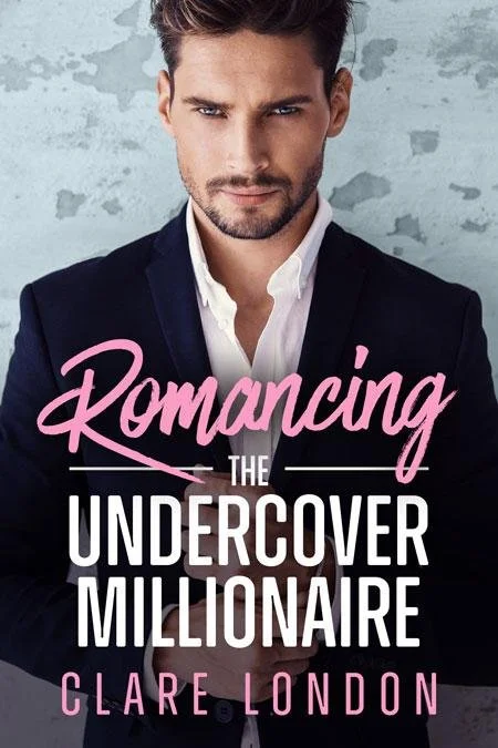 Book cover titled 'Romancing the Undercover Millionaire' by Clare London. The cover features a man with dark hair, wearing a navy blazer and white shirt, looking directly at the camera with a confident expression. The background is a textured gray wall.