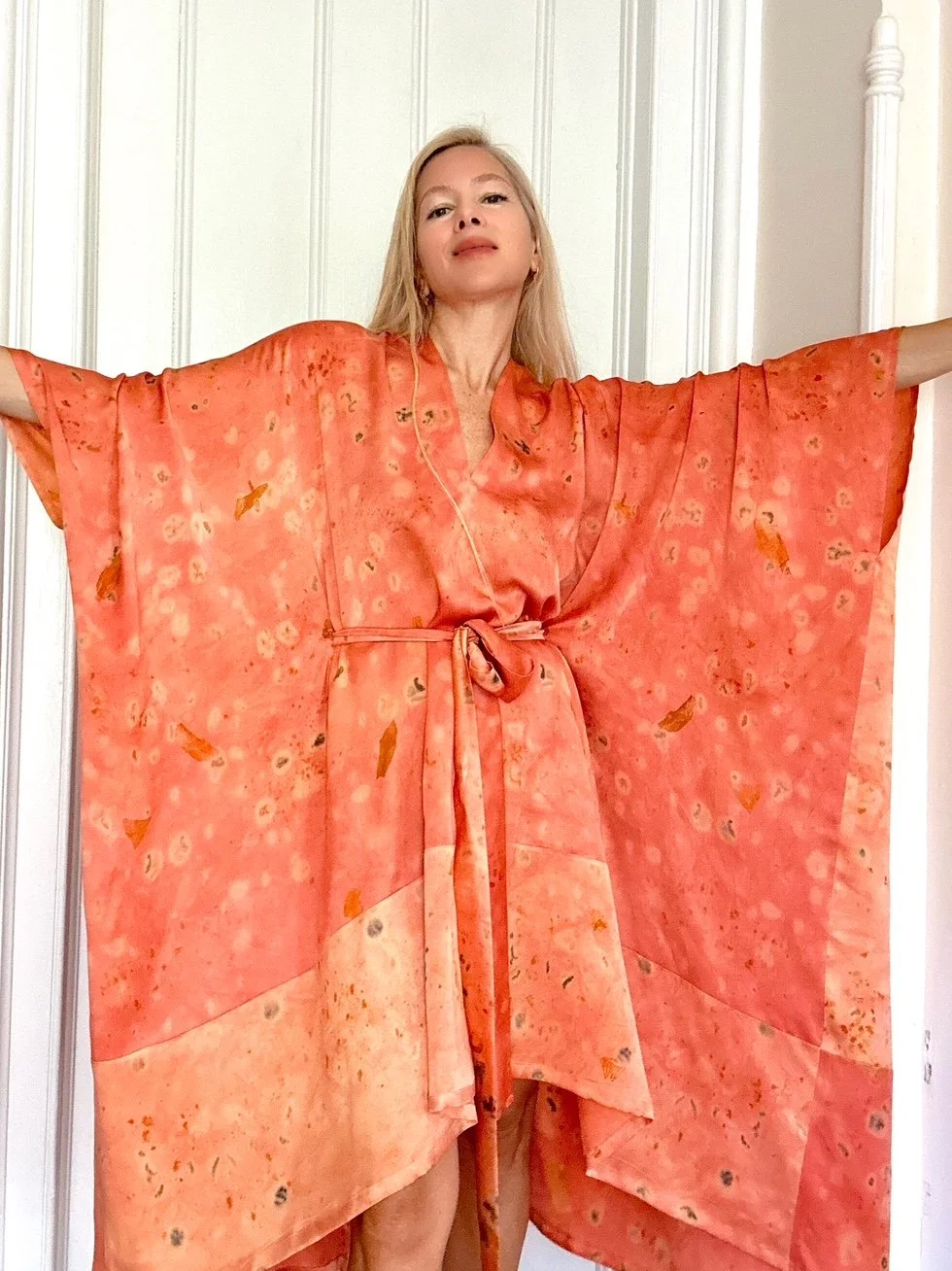 One-of-a-kind silk charmeuse kaftan naturally dyed with madder root and eco-printed with roses. Handmade botanical luxury clothing crafted in New York.. Kimono robe red