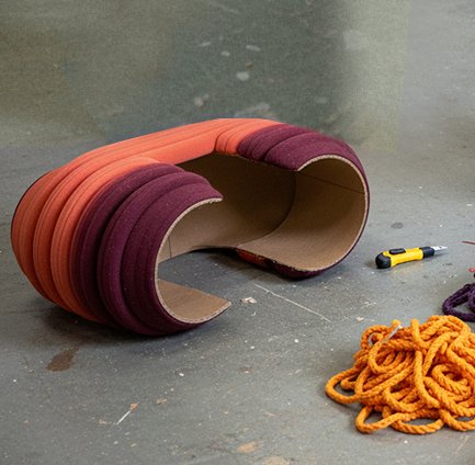 mock-up of colored bands of textile wrapped around a cardboard sonotube