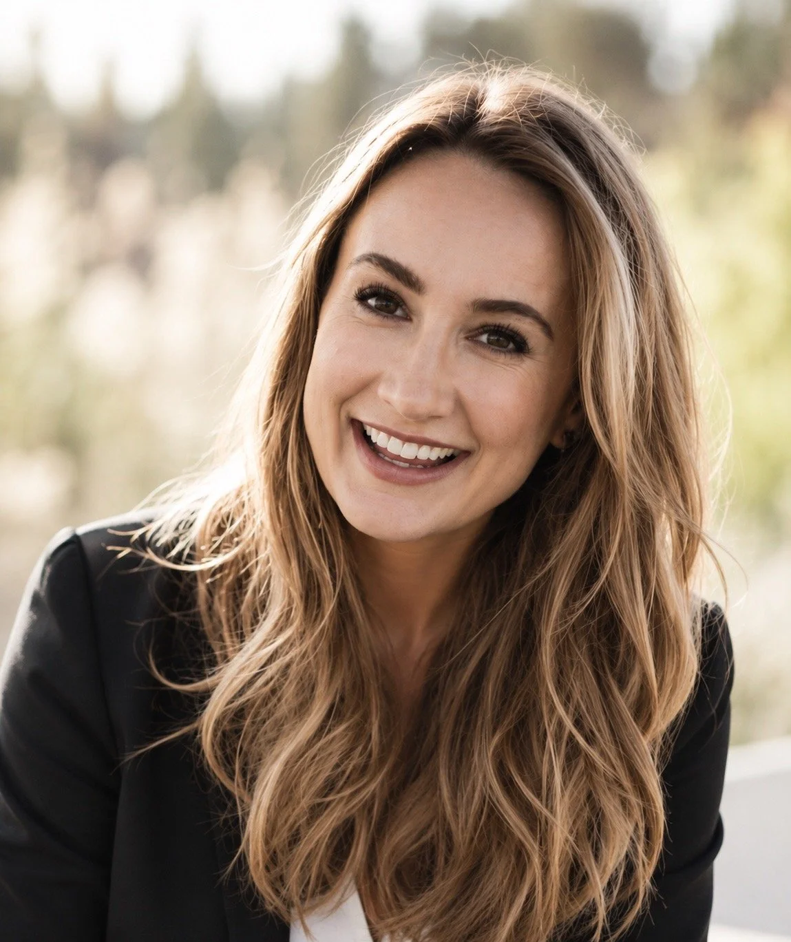 Professional portrait of Sara Peterson, El Dorado Hills Realtor with Peterson Properties, serving buyers and sellers in Folsom, Granite Bay, Shingle Springs, Rescue, Roseville and Placerville.