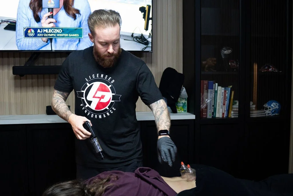 Dr. Casey Irvine sports physical therapist in Cary NC working with athlete on rehabilitation