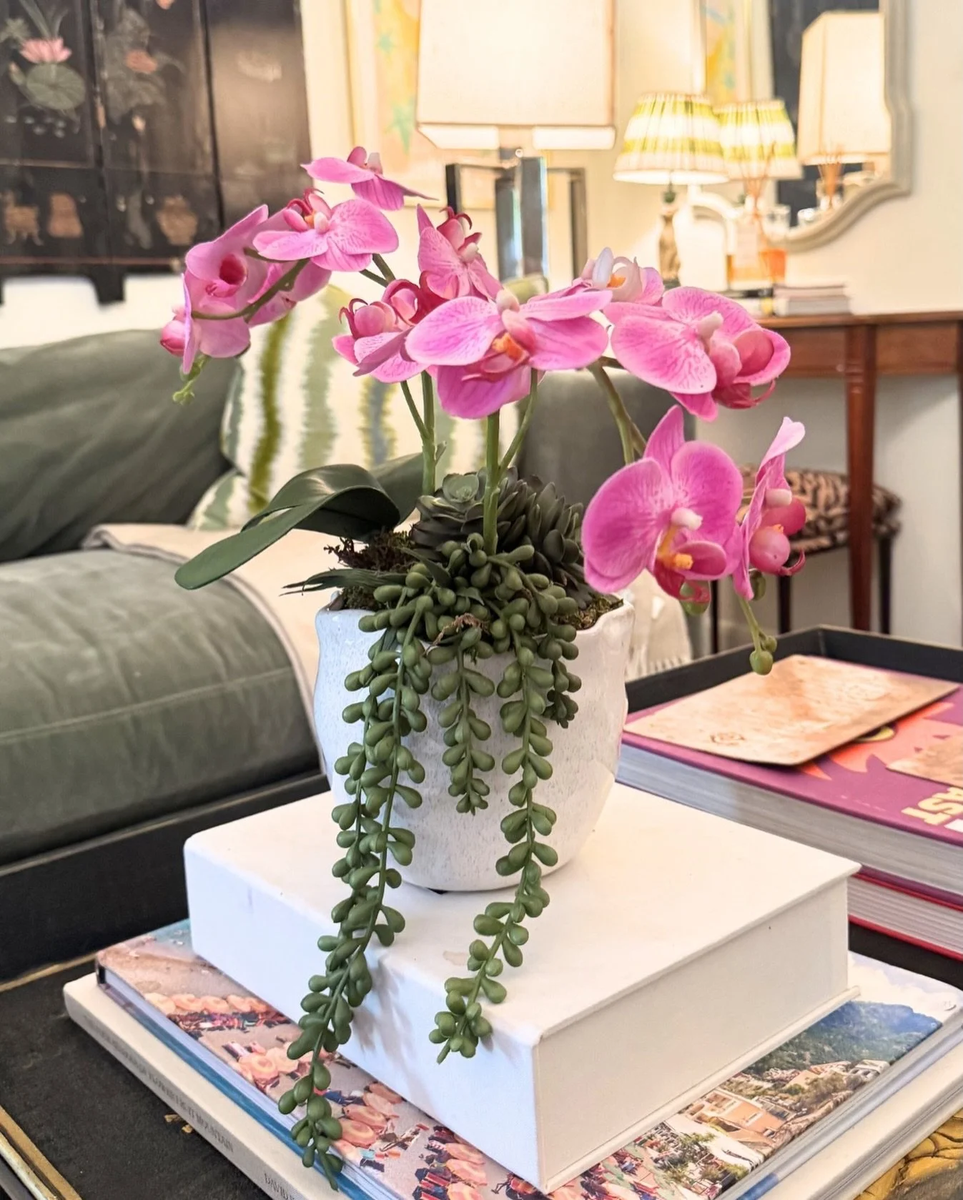 This week&rsquo;s featured faux orchid is here! Designed with vibrant purple blooms and nestled among beautiful succulents.

Available now with local delivery. Send us a DM to make it yours! ✨$135