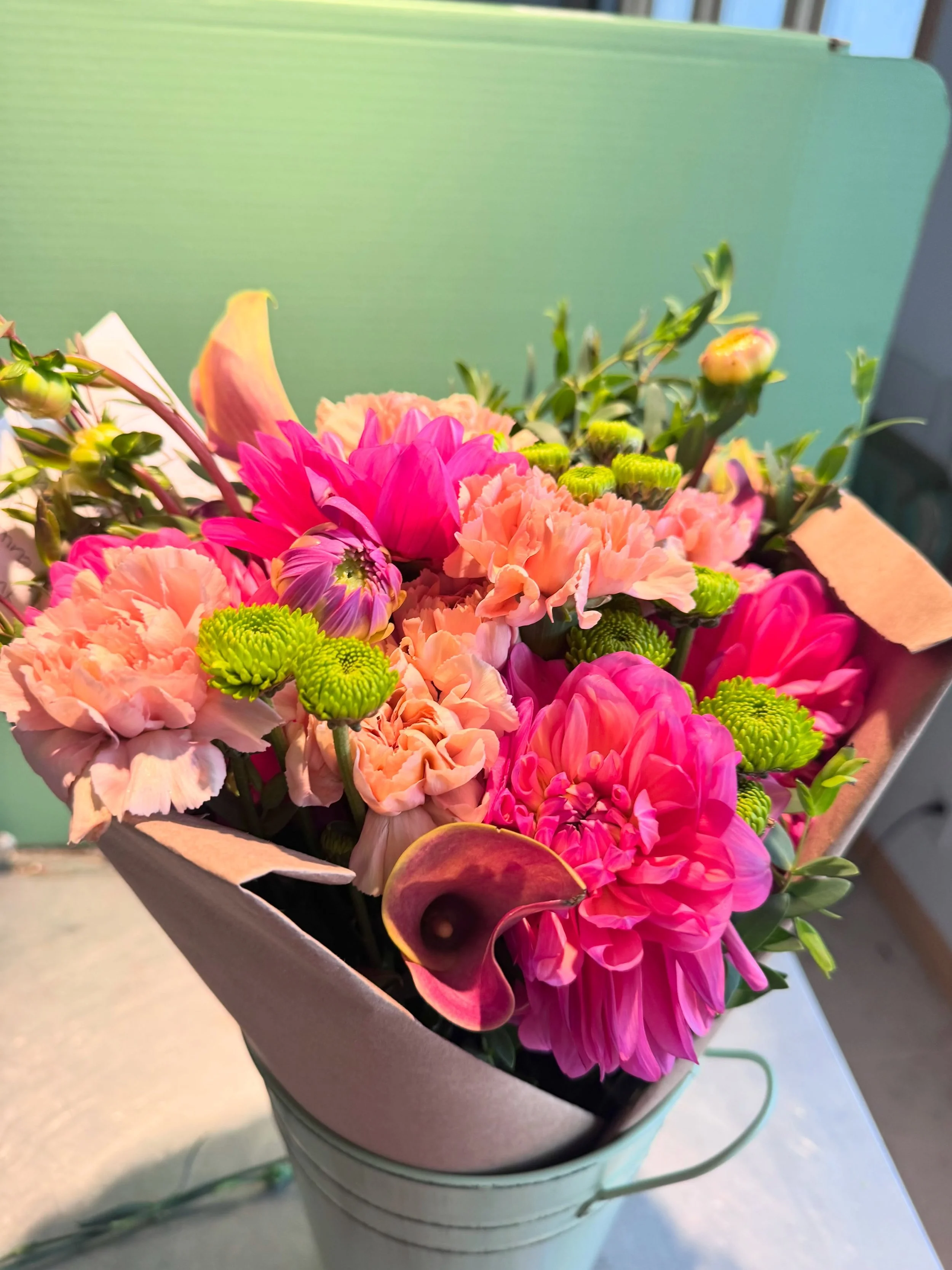 A little sunshine for your weekend ahead!💐

This Friday&rsquo;s bouquet features dahlias, carnations, mums, calla lilies, and fresh eucalyptus, bringing all the bright, cheerful colors of summer into one arrangement.

Available for Friday delivery. 