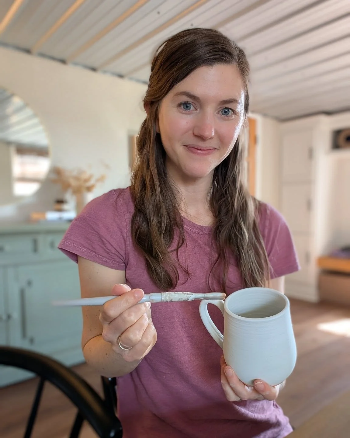 In my happy place. Glazing mugs, watching (mostly listening to) Gilmore Girls.

Today we had a nice long nap so I got to glaze, sand, mop, and even test some new trimming/sculpting techniques.

I'm so ready for Spring. Things to come will be colorful