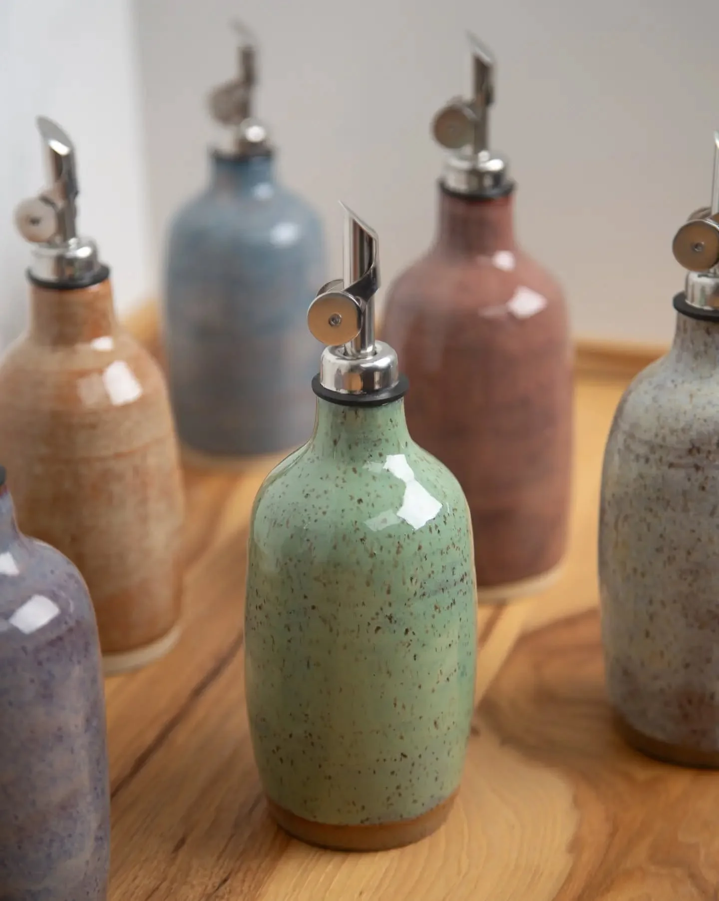 It's about time!

I had plans to make oil bottles for years, but delayed because I didn't take time to find a spout I liked.

While it's partially true - it's difficult to find accessories that fit well and serve handmade work at a comparable quality
