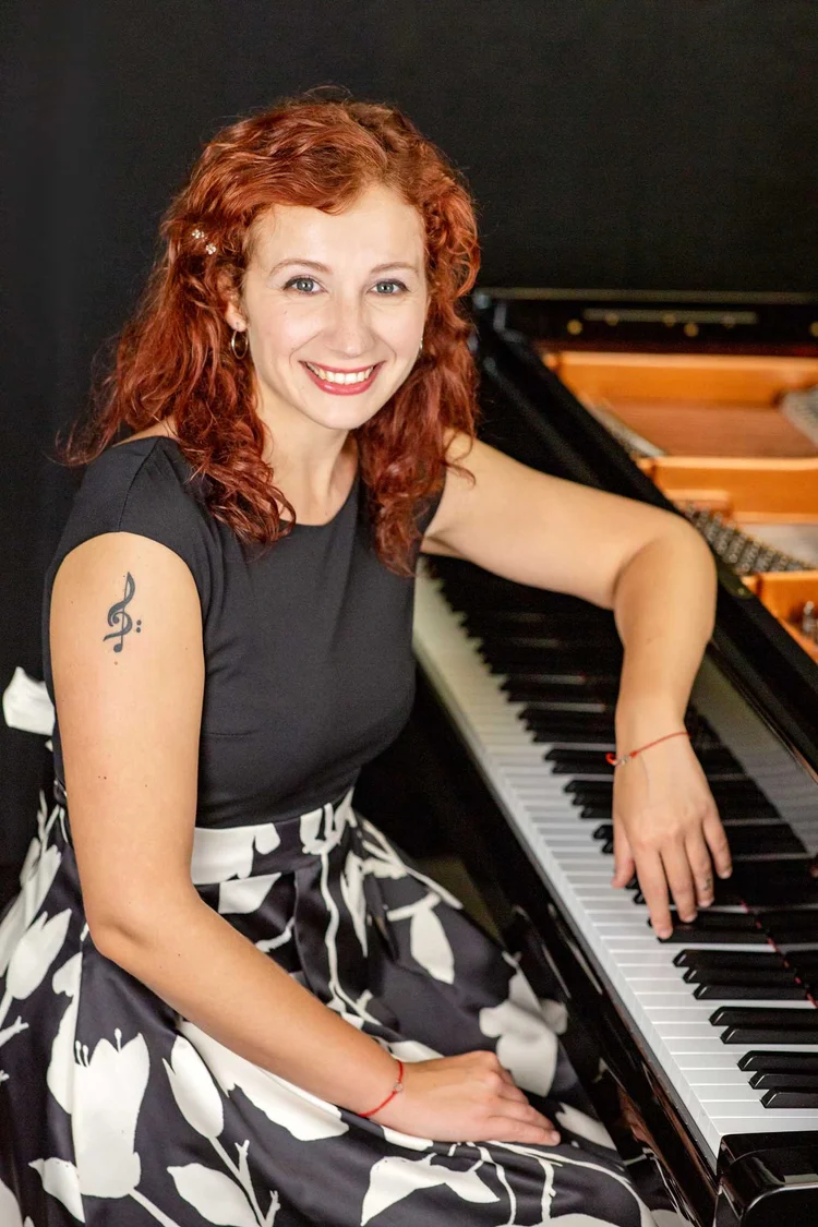 Madalina Danila seated at the piano