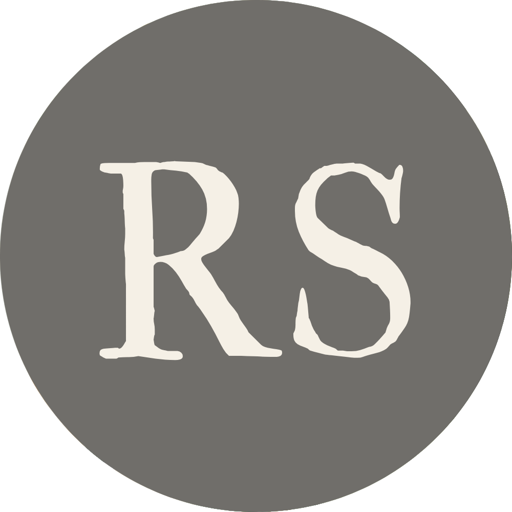 A gray circular background with the white initials 'RS' in the center.