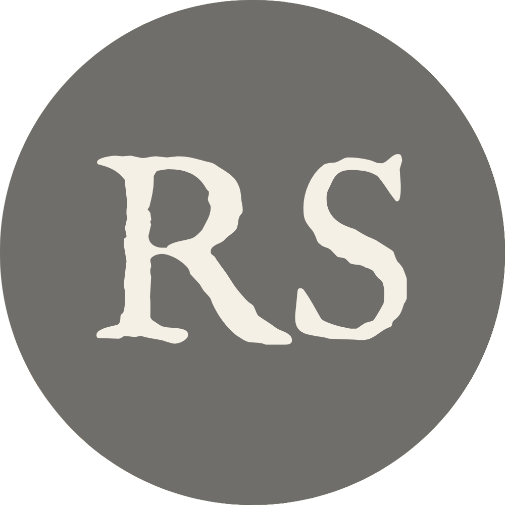 A gray circular background with the white initials 'RS' in the center.