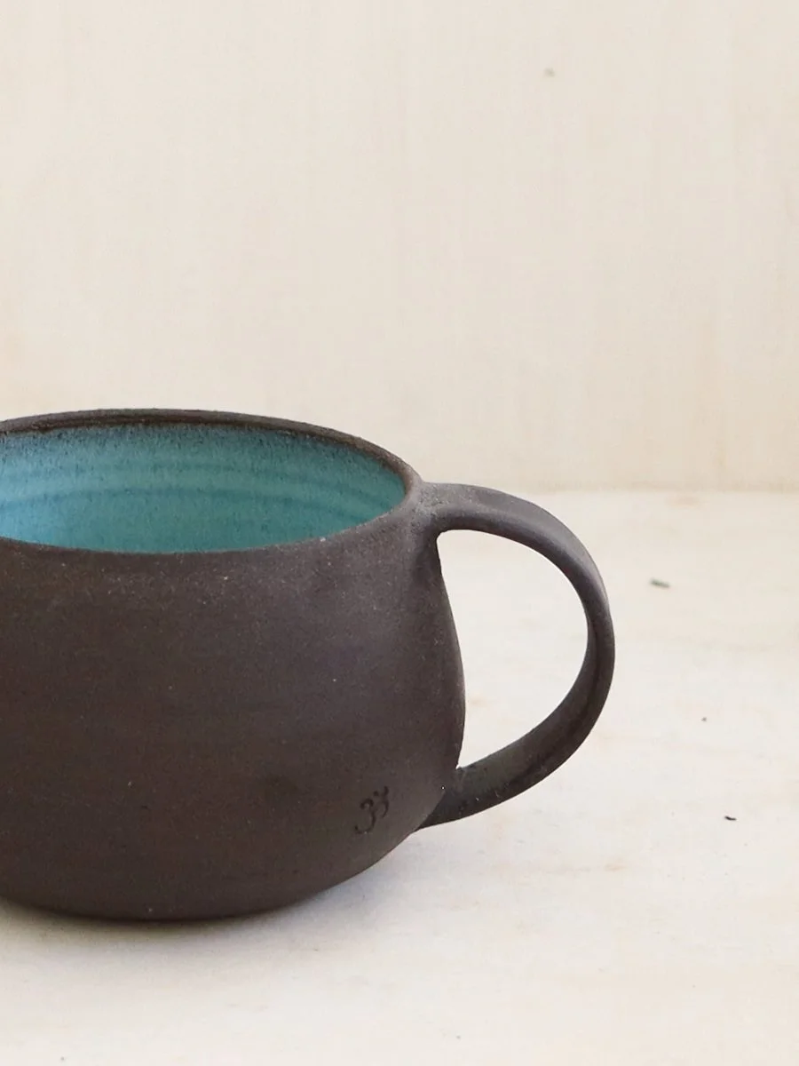Aigosthena_Lava_Om_Mug-4.jpg