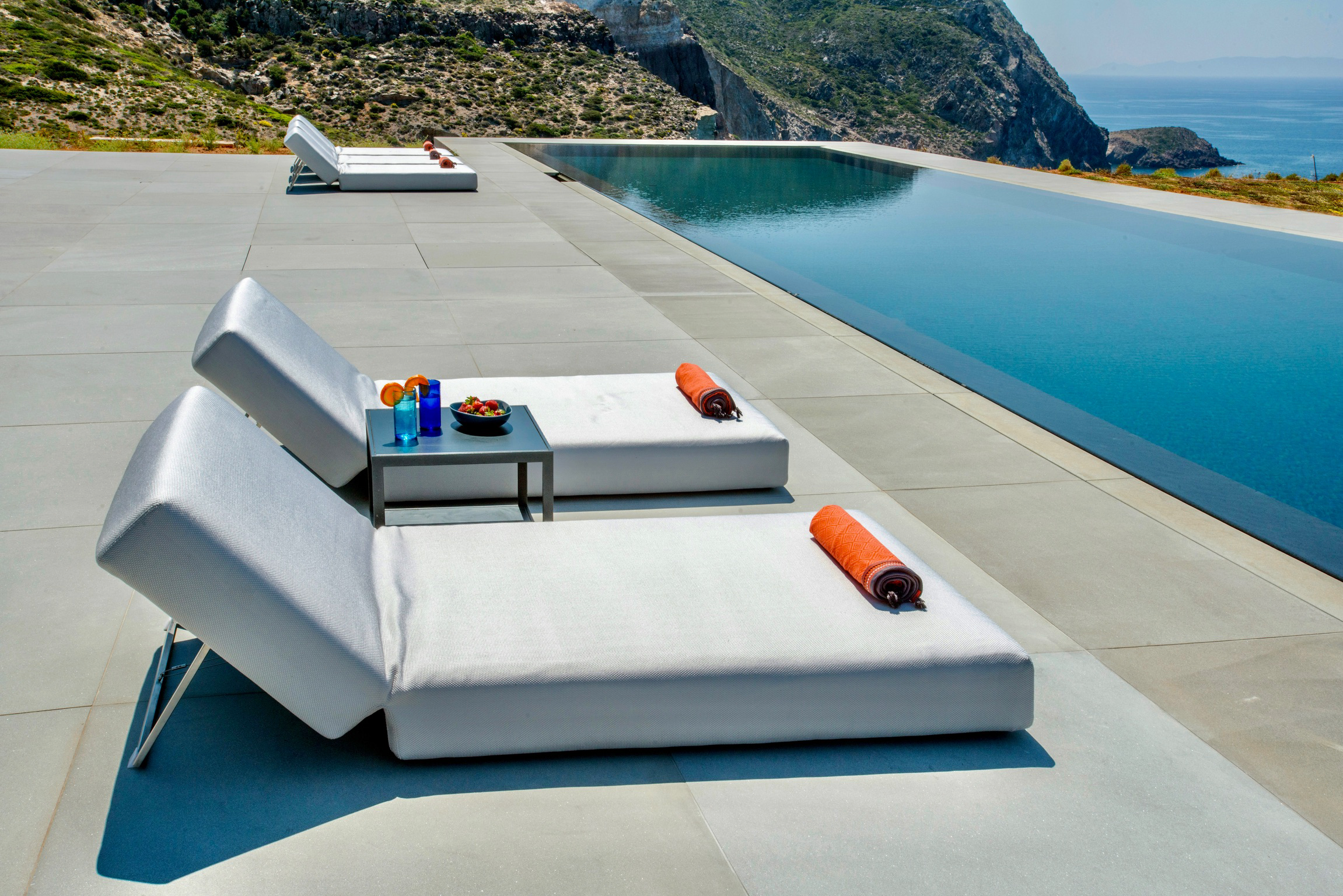 127 CST By the pool grey sunlounges.png