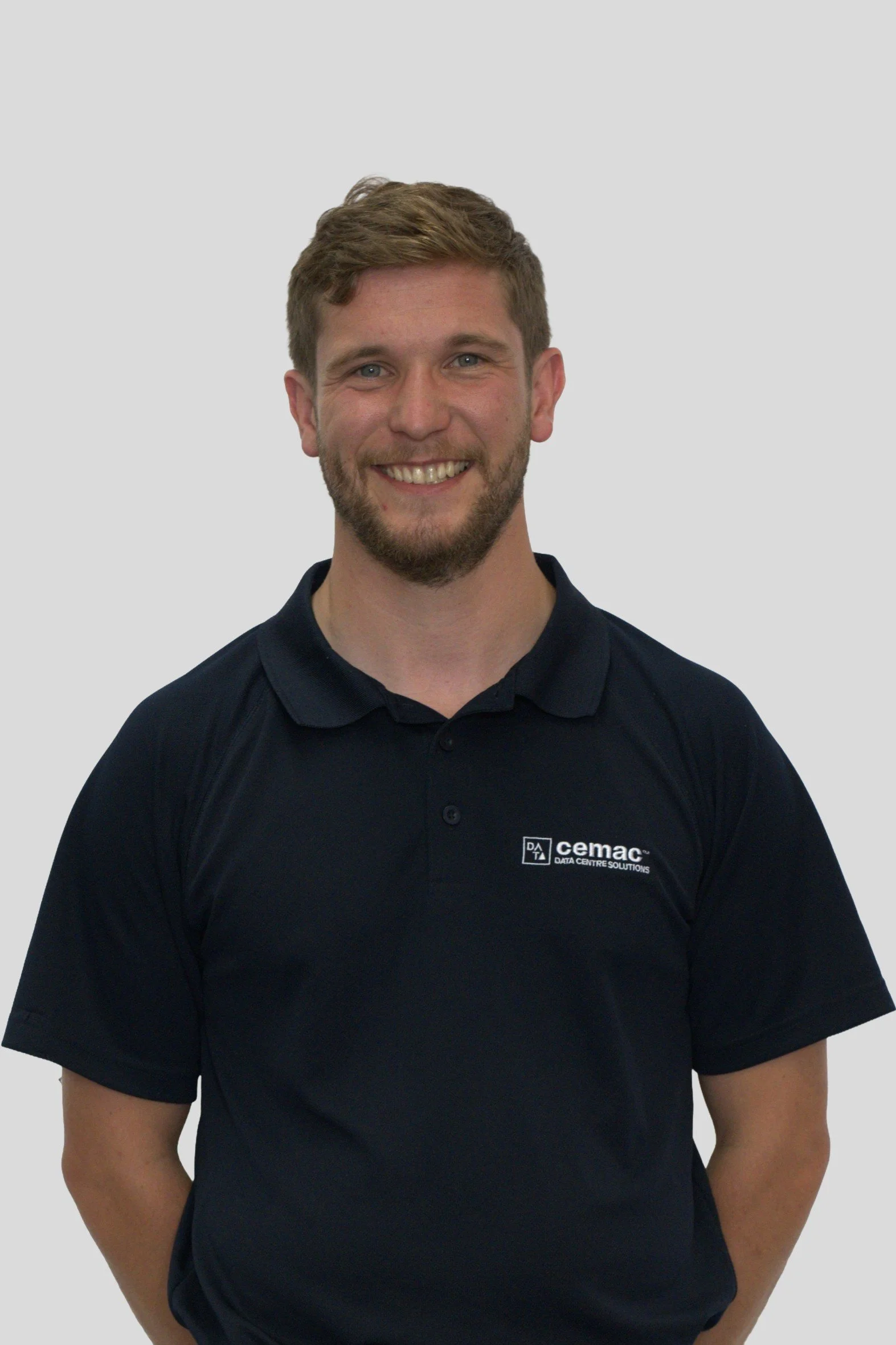 Young professional man in black shirt.