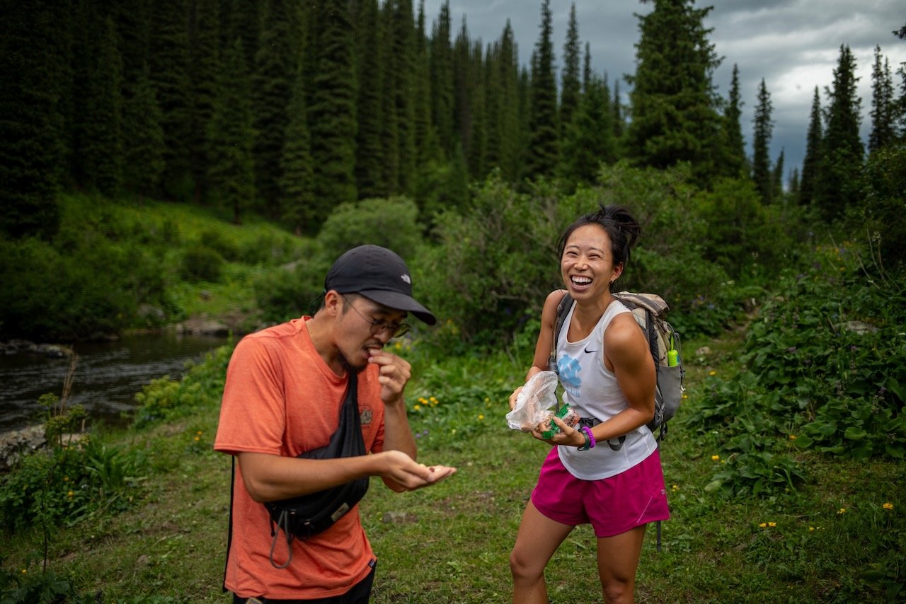 Quick snack break! More hikers means more snacks to share. Photo credit: Erwaan F.