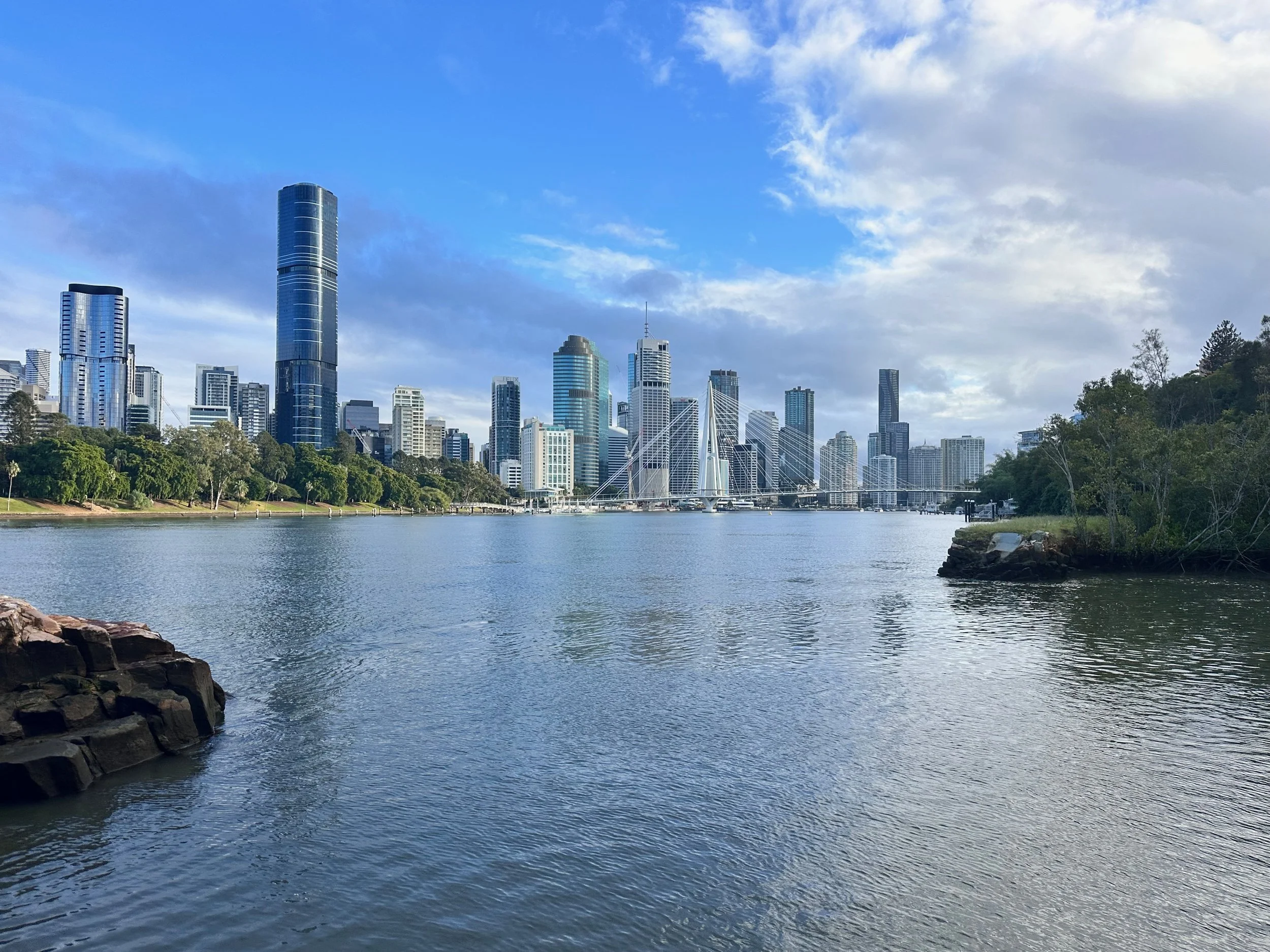  Brisbane from the water. There’s a river that flows through the city, which reminds me of Chicago — the steel skyscrapers that loom by the water’s edge, the modern design, and this feeling in the air.  