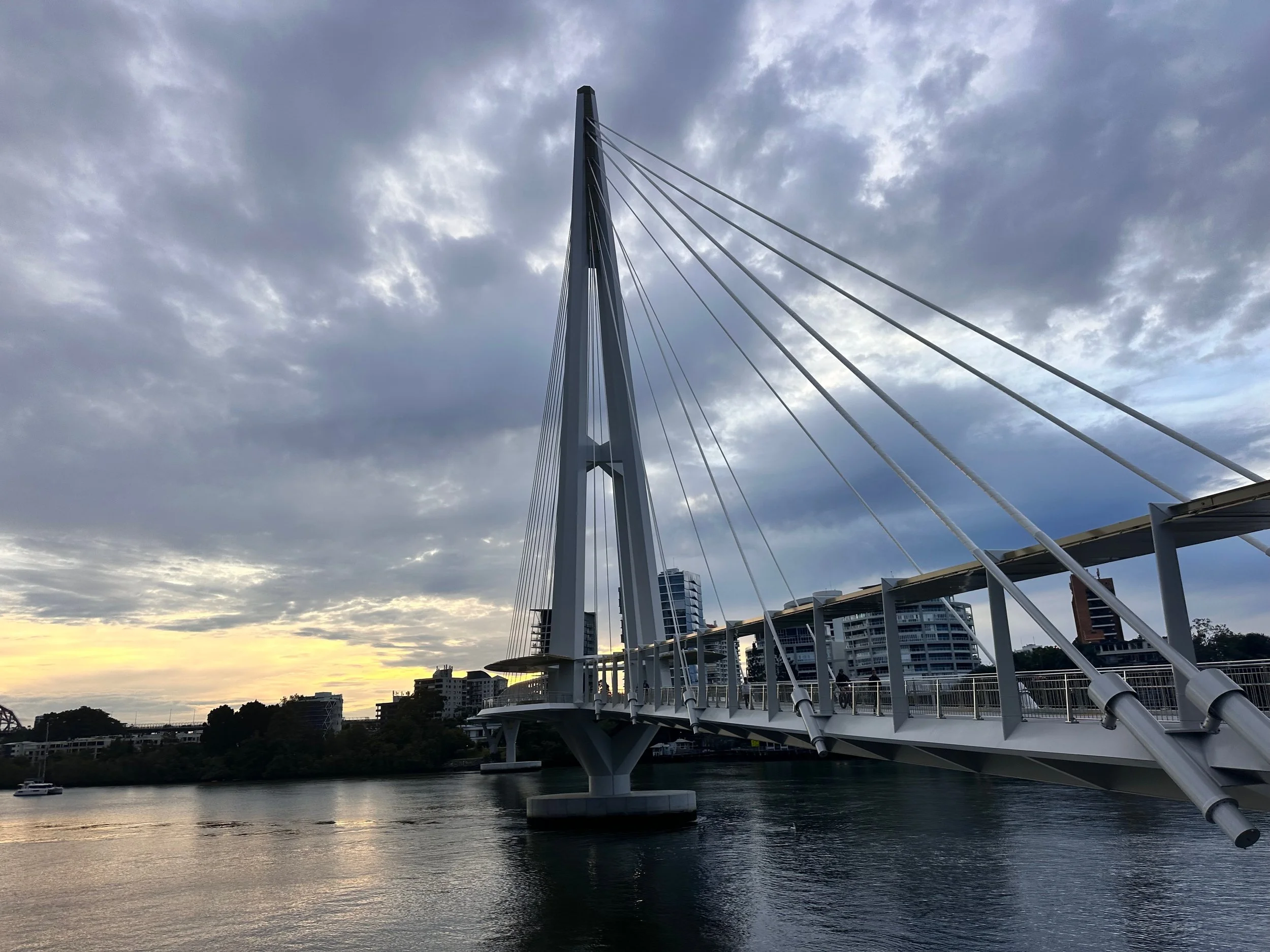 One of the many pedestrian bridges that connects the two sides of the winding river. 