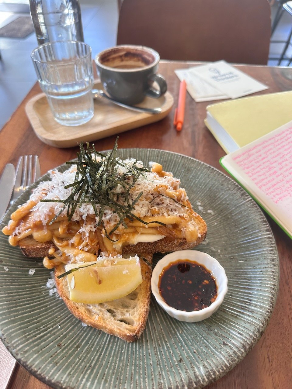  A favorite meal of mine - breakfast toast topped with burrata, king and oyster mushrooms, and drizzled with chili oil.  