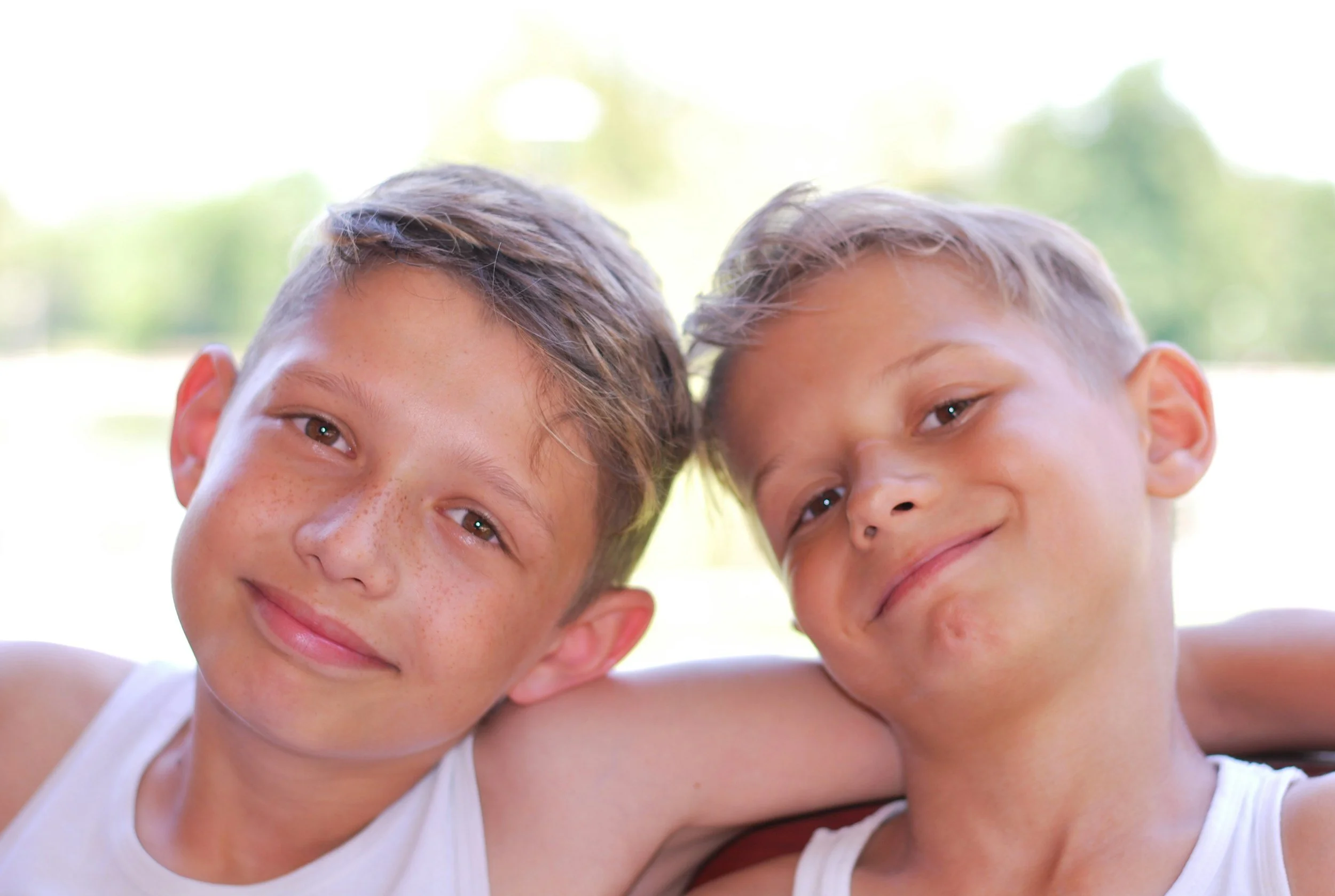 Two boys smiling at camera