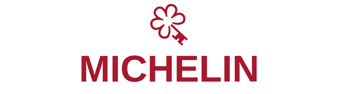 Das Logo von Michelin, bestehend aus einem roten Gummireifen mit einer Krone und das Wort »MICHELIN« darunter.