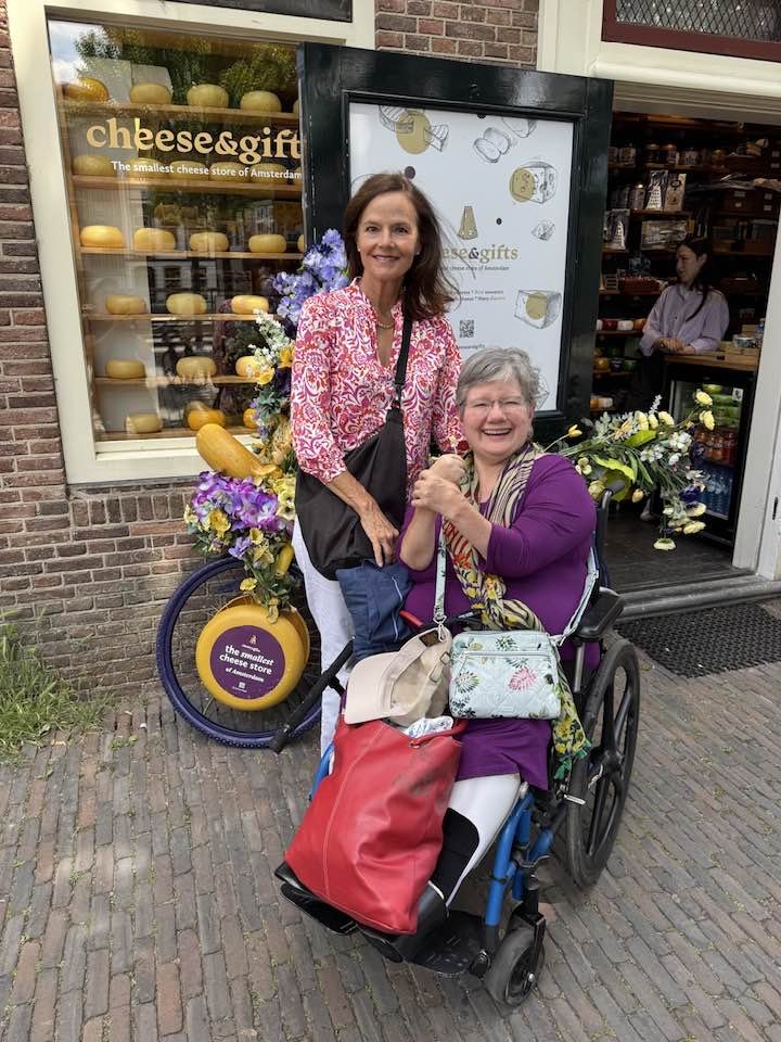 Amy and her sister sample cheese in Amsterdam. 