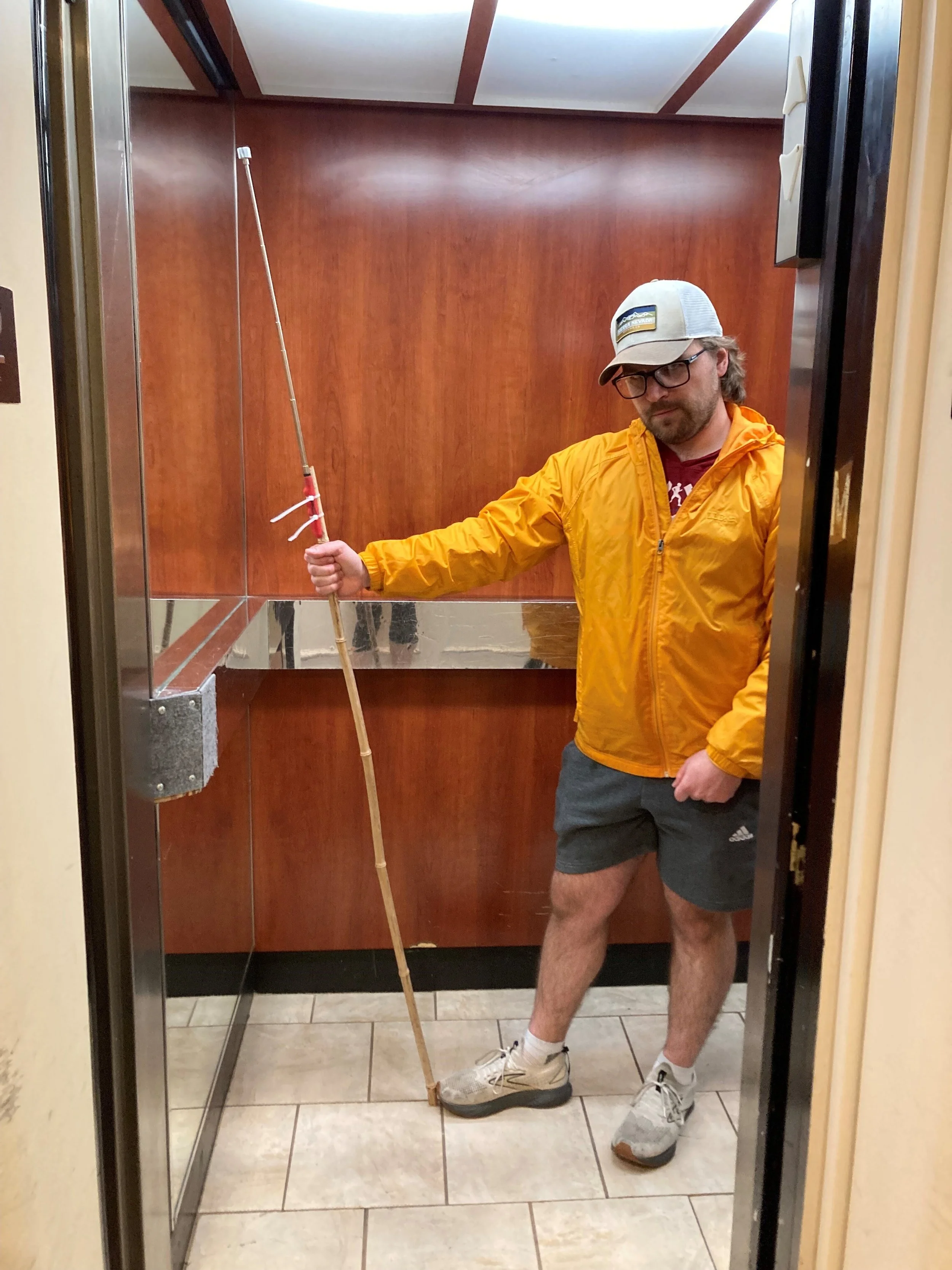 Annie's husband, Zach, rescues keys that fell down the elevator shaft.