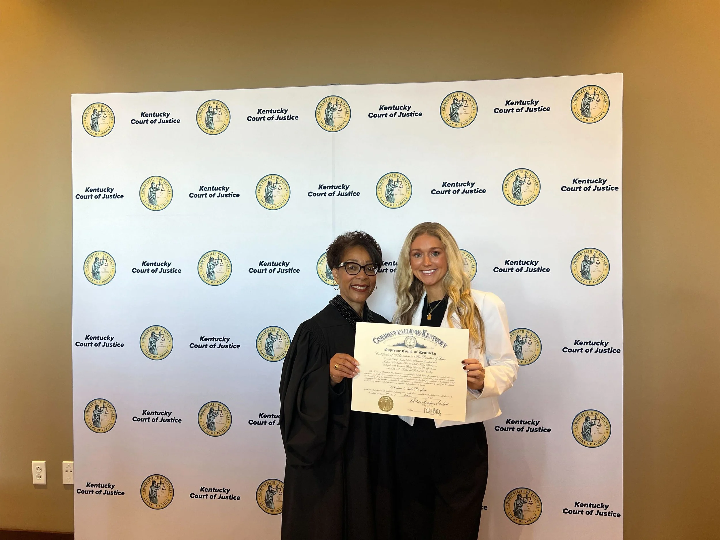 Andrea with Justice Goodwine at her swearing in ceremony. 