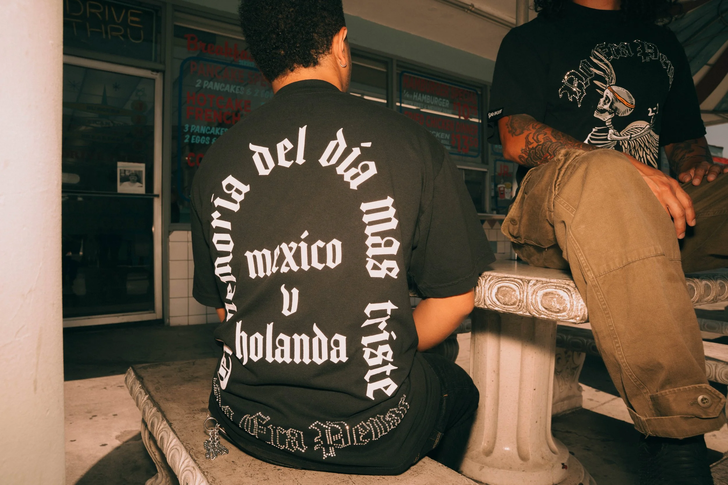 MUNDIAL Partner with Junior H’s Sad Boyz for No Era Penal tee Colab