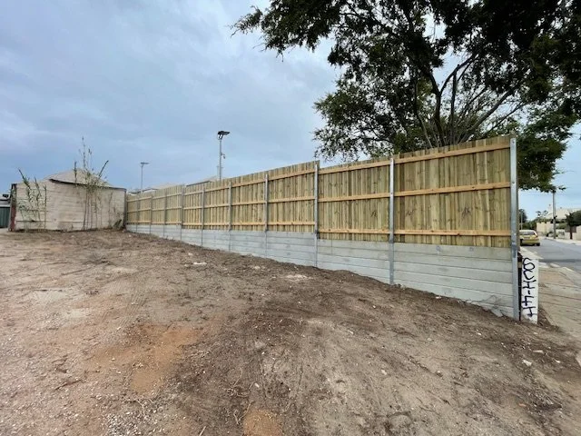 Paling fence in property installed