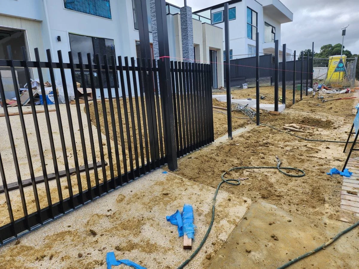 Vertical blades black color with 24v sliding gate plus pedestrian gate and letter box in Huntfield Heights