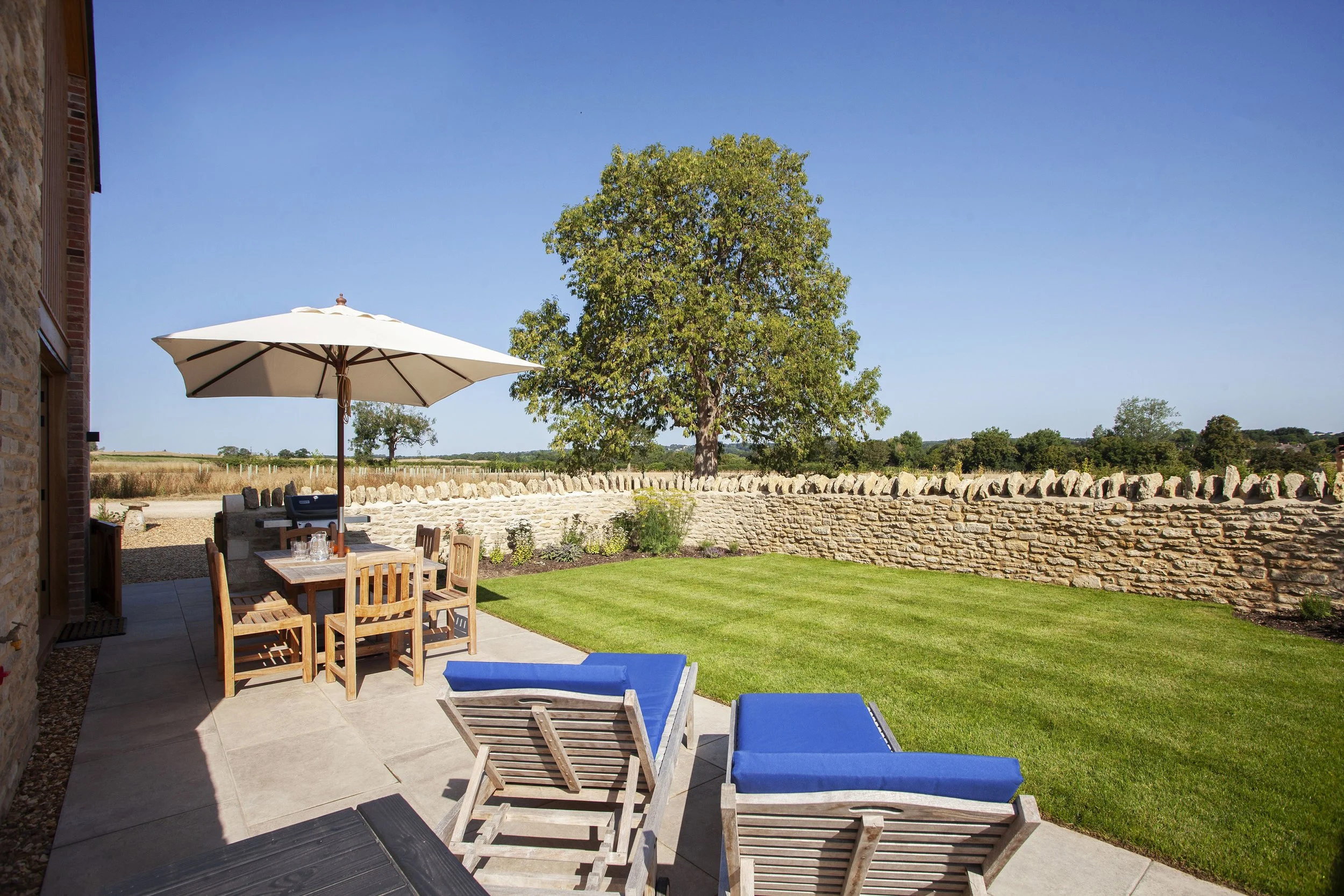 Sunny garden with views of the surrounding countryside
