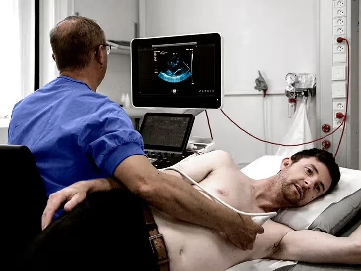 Cardiologist performing an echocardiogram with a patient at MISH