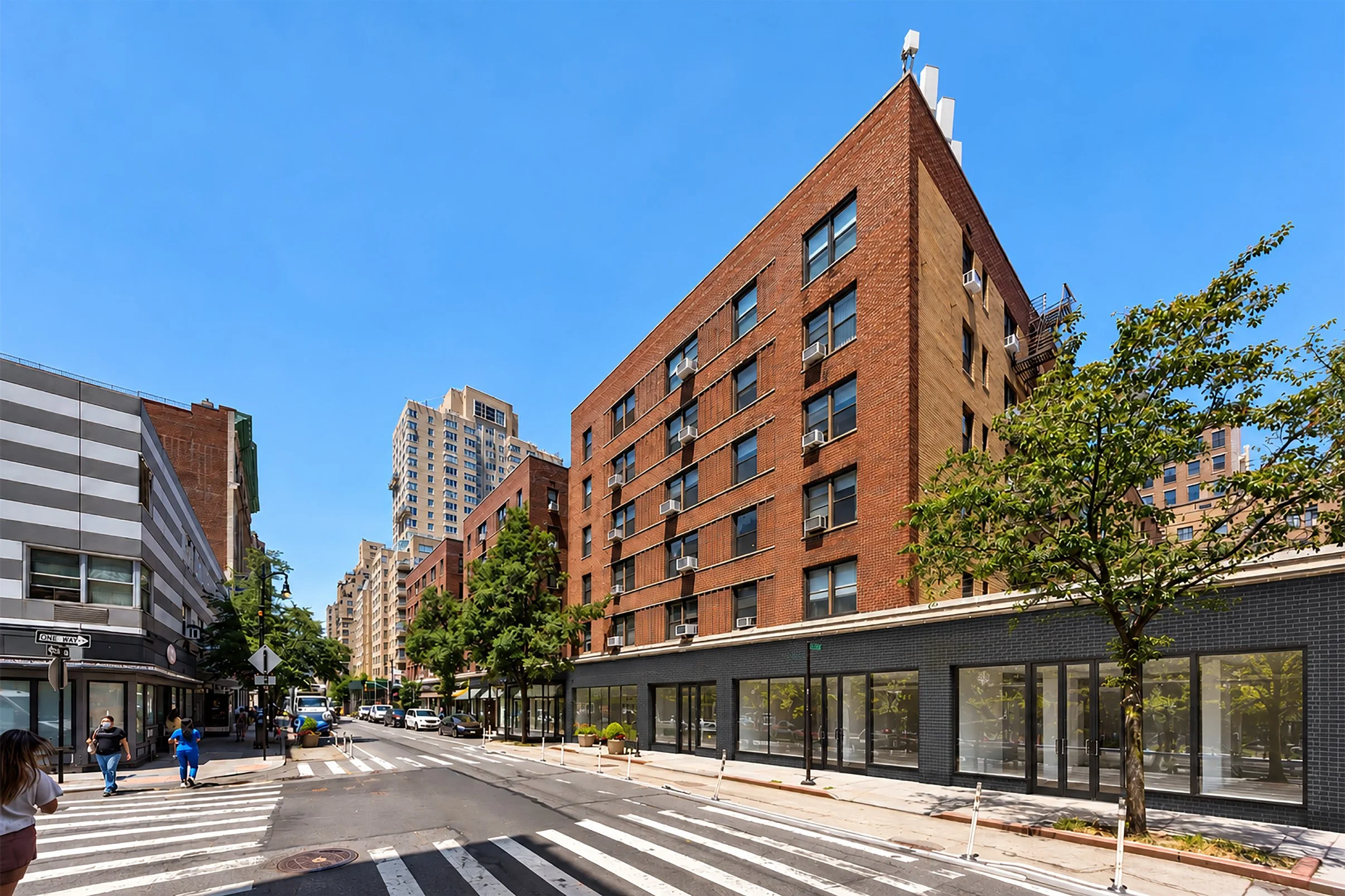Charcoal Brick Storefronts Beneath Red Brick Towers copy.jpg