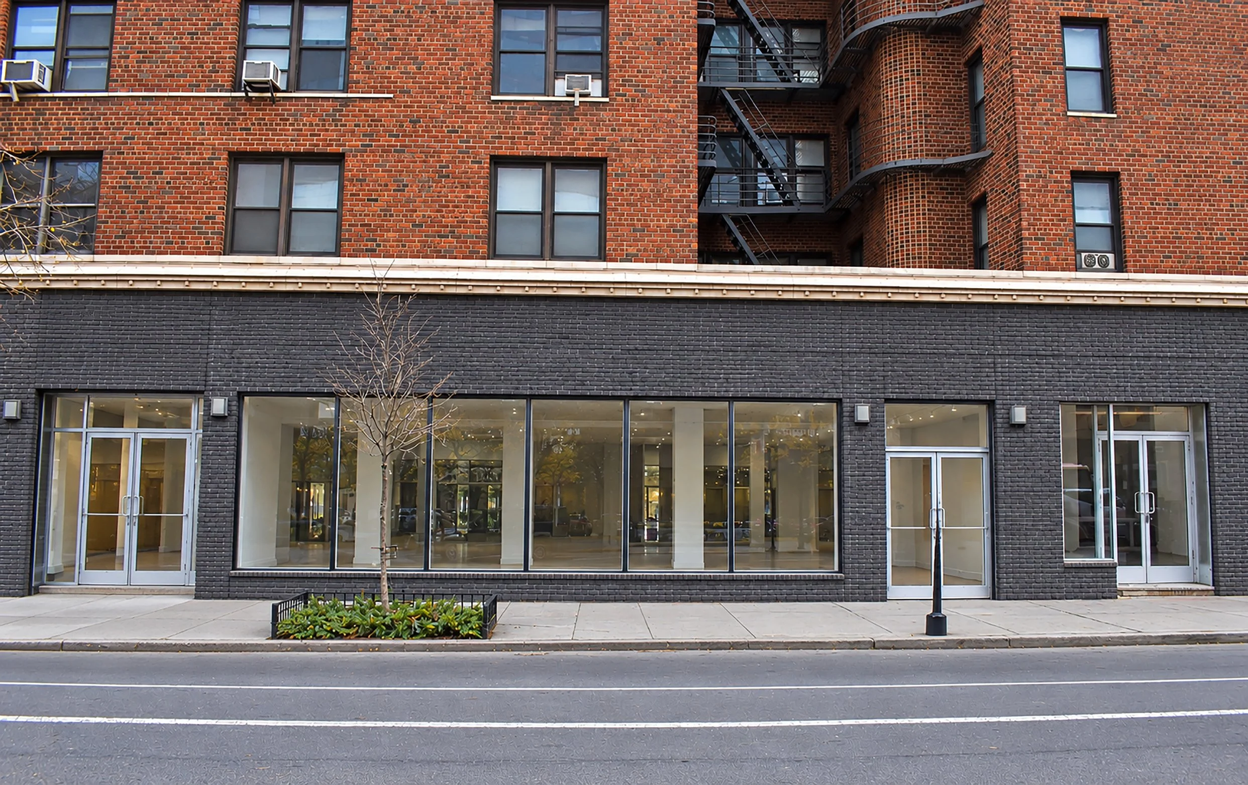 Minimalist Charcoal Brick Storefront in Winter Cityscape copy.jpg