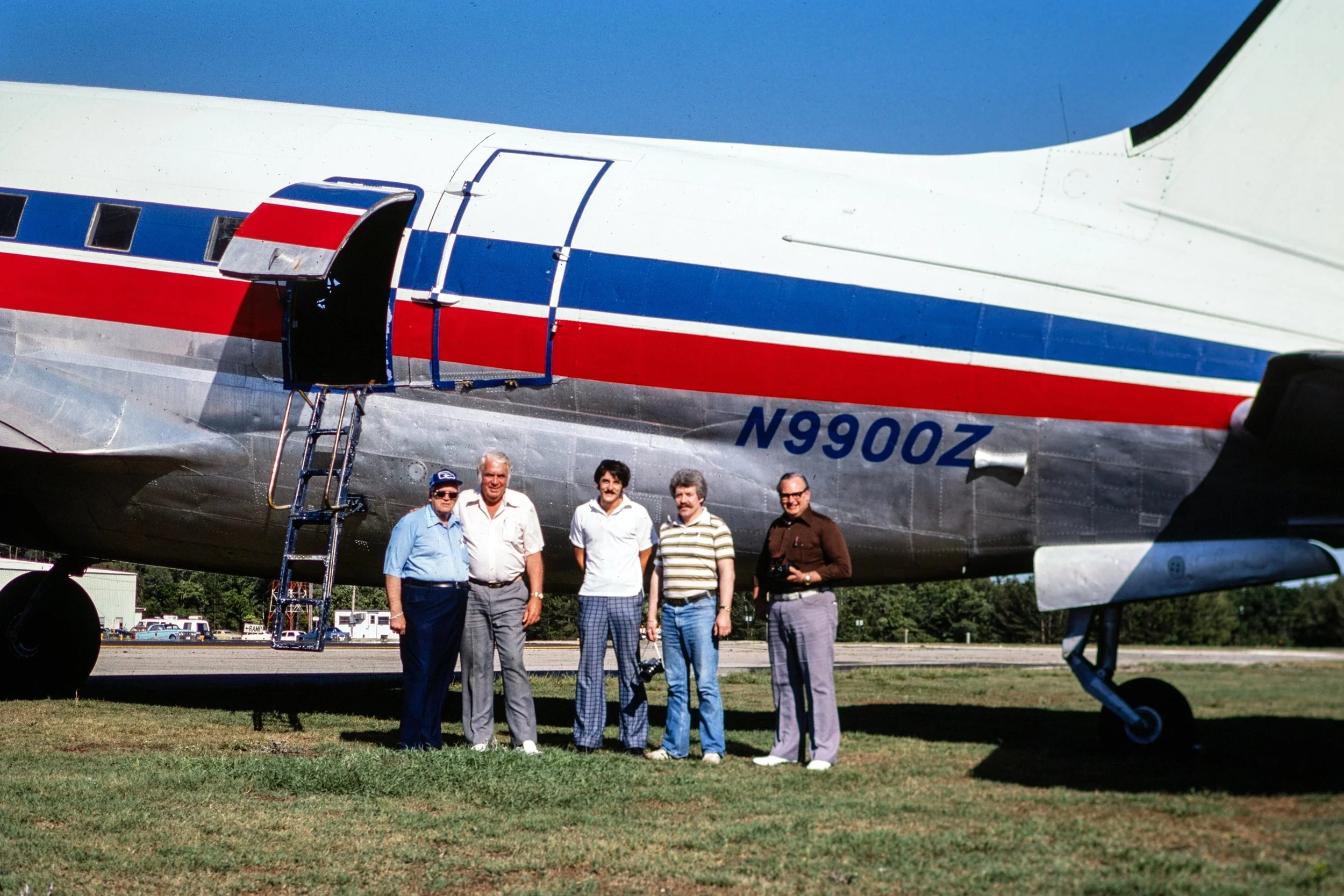 Bill and Jeff Whitesell in front of Challenge Air Transport's Curtiss C-46A N9900Z