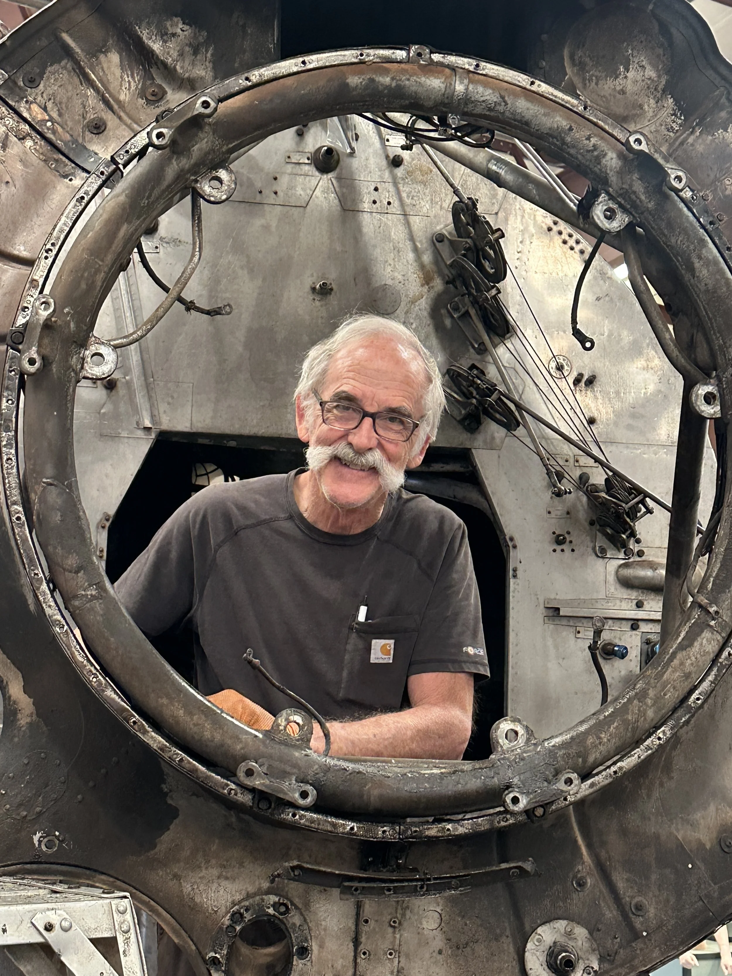 Jeff Whitesell pictured here in the ring of a P&W R2800 engine mount on his Martin 404