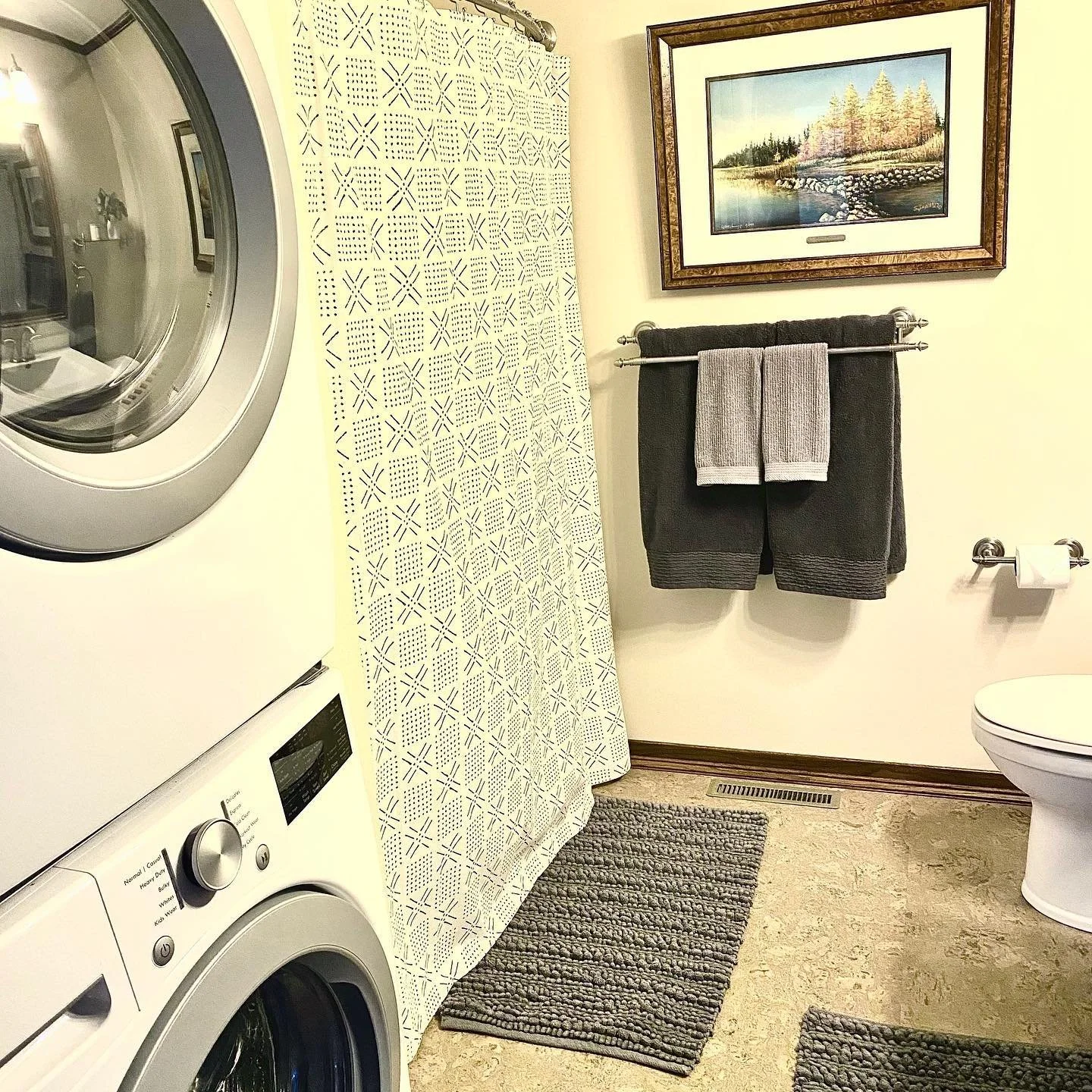 Laundry room with washer, dryer, and attached bathroom in cabin.”
Snowshoes by Lake