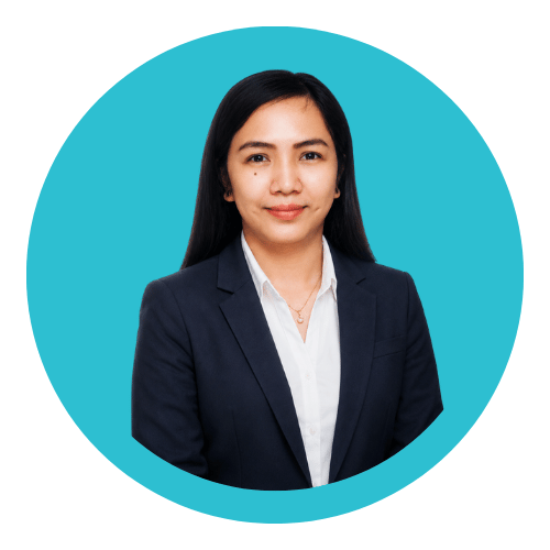 Professional woman with long dark hair wearing a navy blazer and white shirt, posing against a blue circular background.