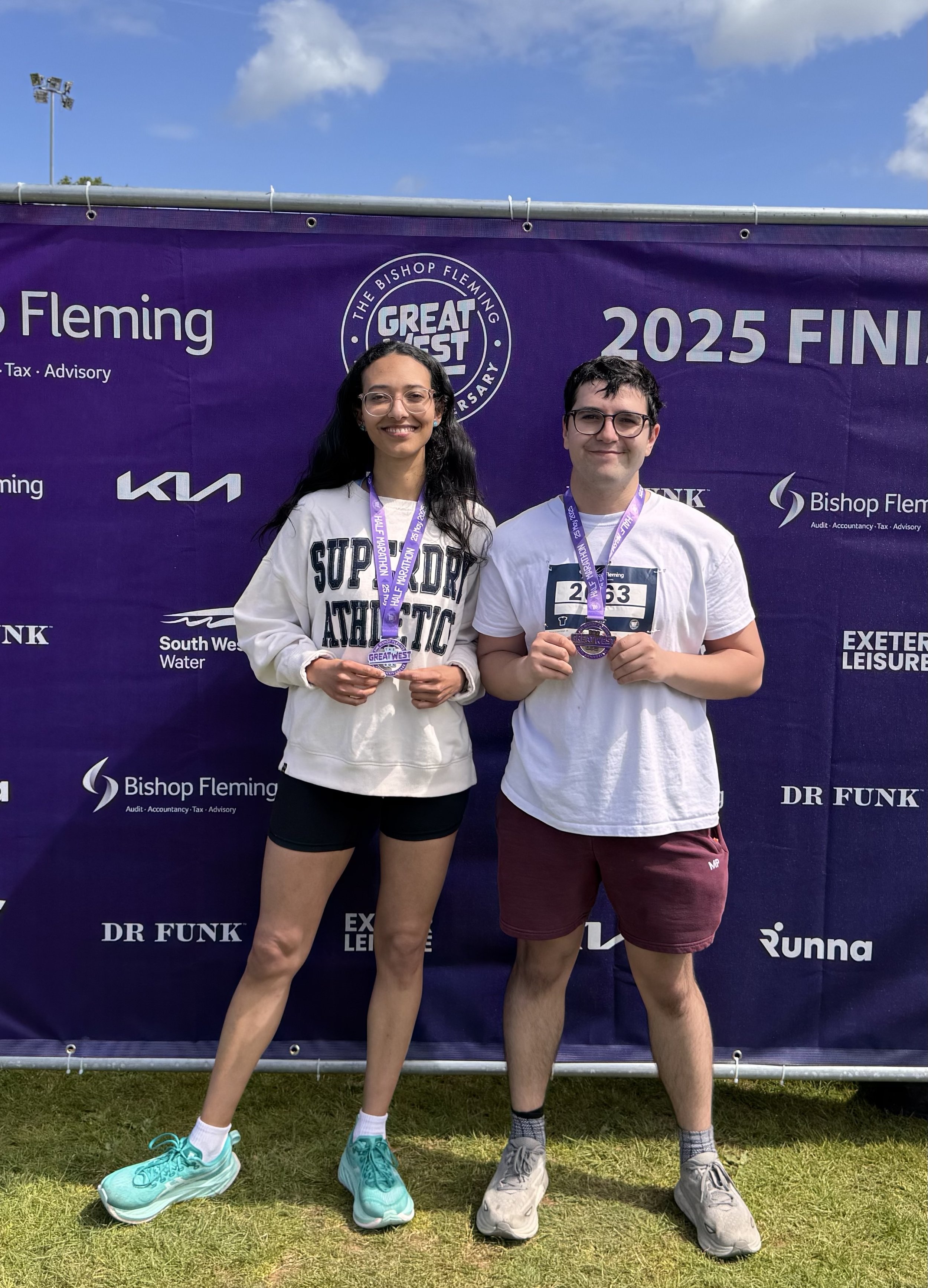 Work hard and play even harder!
Johanna and Antonio with their medals after completing the half-marathon, Exeter, 2025