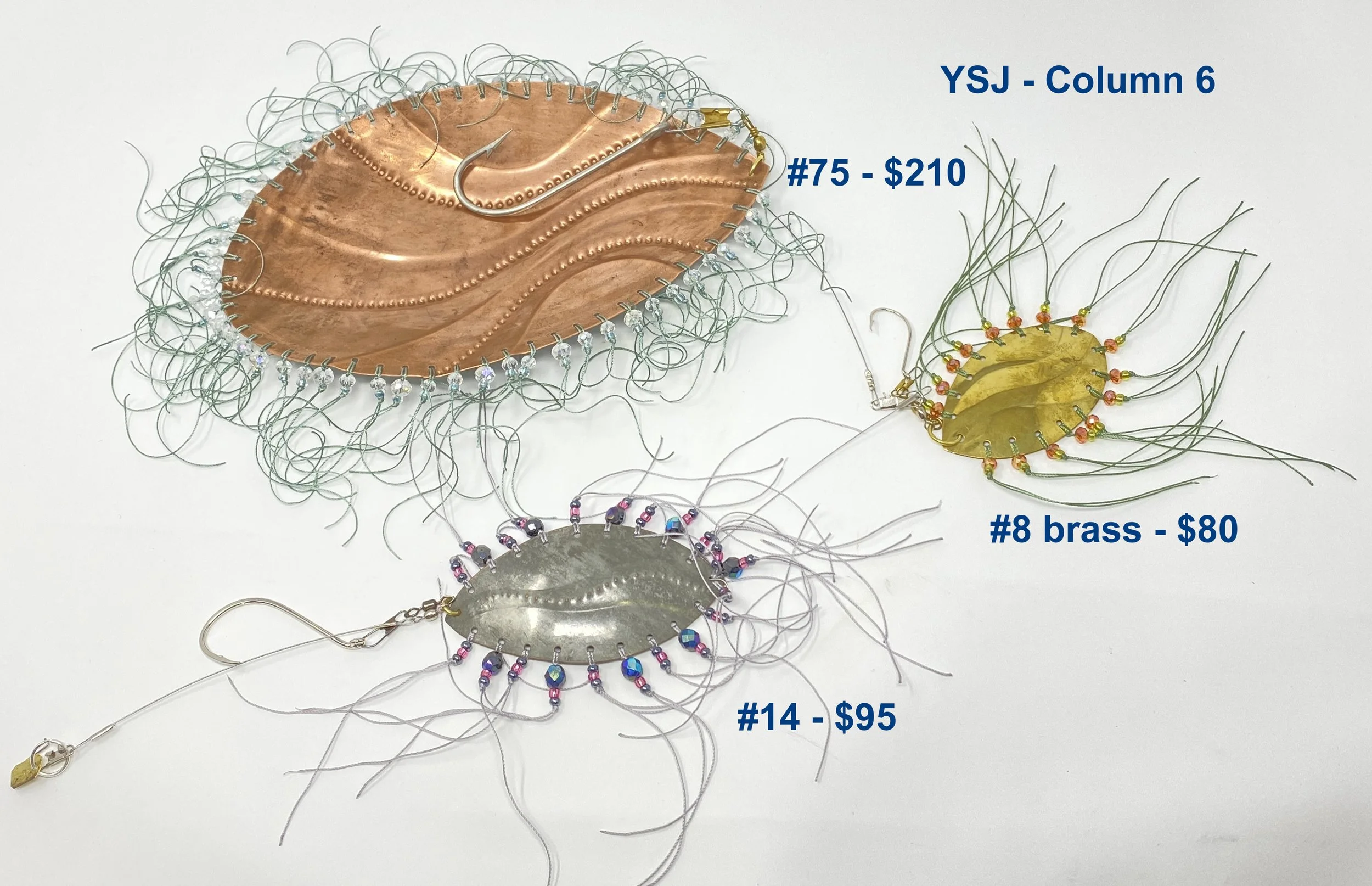 Column 6
#14 - tinned copper, waves w bumps, irridescent
dk blue faceted beads, hot pink seed beads,
silver threads, silver hook
$95.00
#8 - brass, waves, copper pink faceted beads,
light green threads, silver hook
$80.00
#75 - tinned copper, waves w