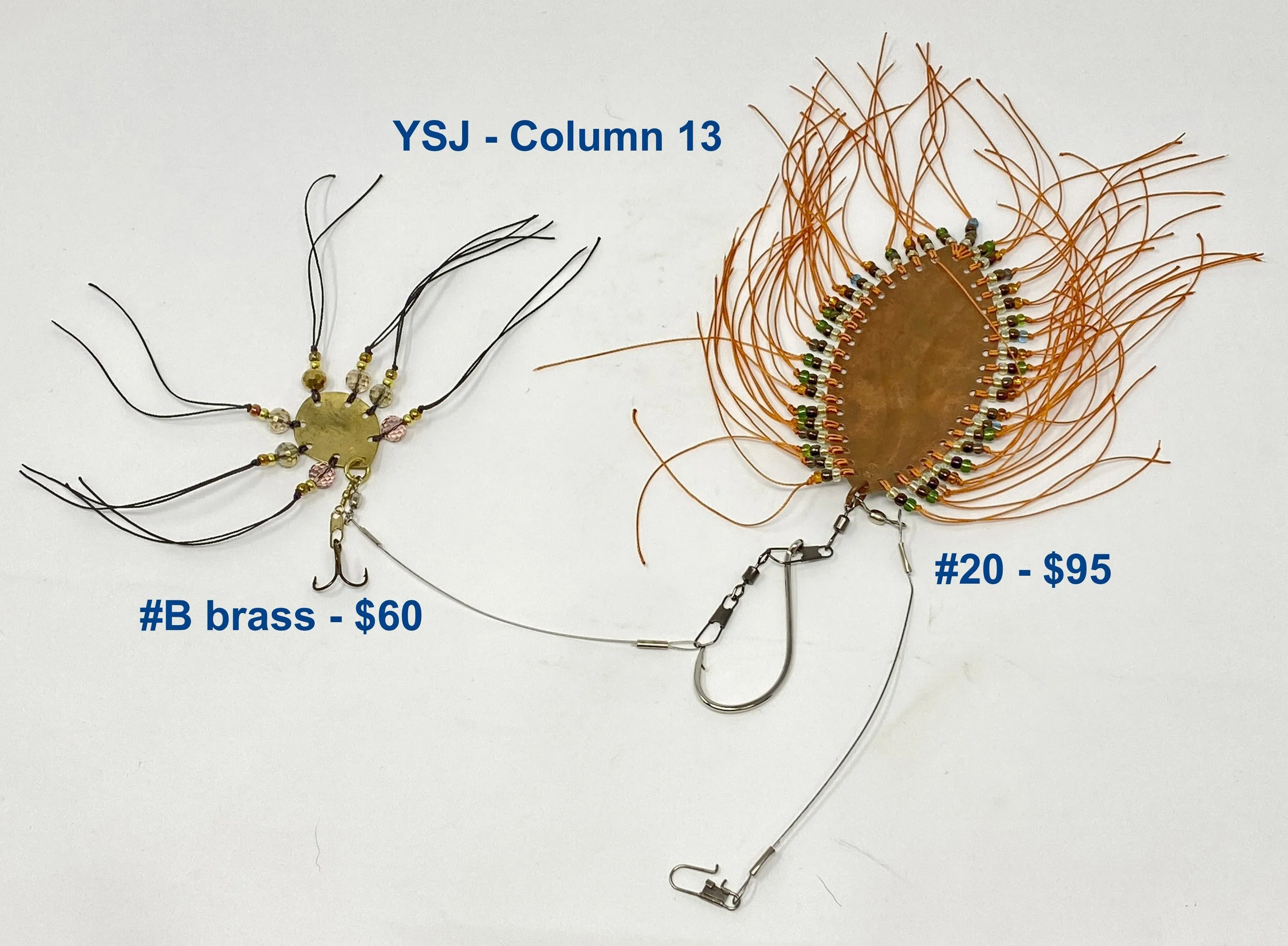 Column 13
#20 - tinned copper, waves, double seed beads, orange threads, silver hook
$95.00
#B - brass, 7 large faceted beads, black threads, triple hook
$60.00