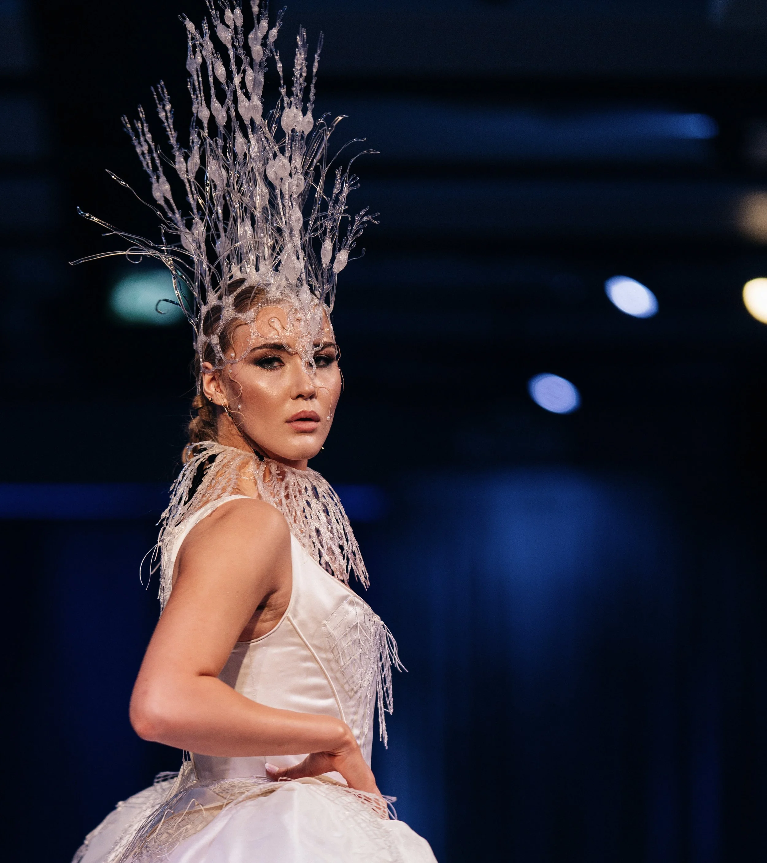 "Wedded to Plastics"
photo credit Kelly Hofer
worn by Abby Huising 
Awaken New Depths - Future Oceans International's sustainable fashion event 2024
Our wearable art piece begins the historical story in the 18th century. The Wedded to Plastic outfit 