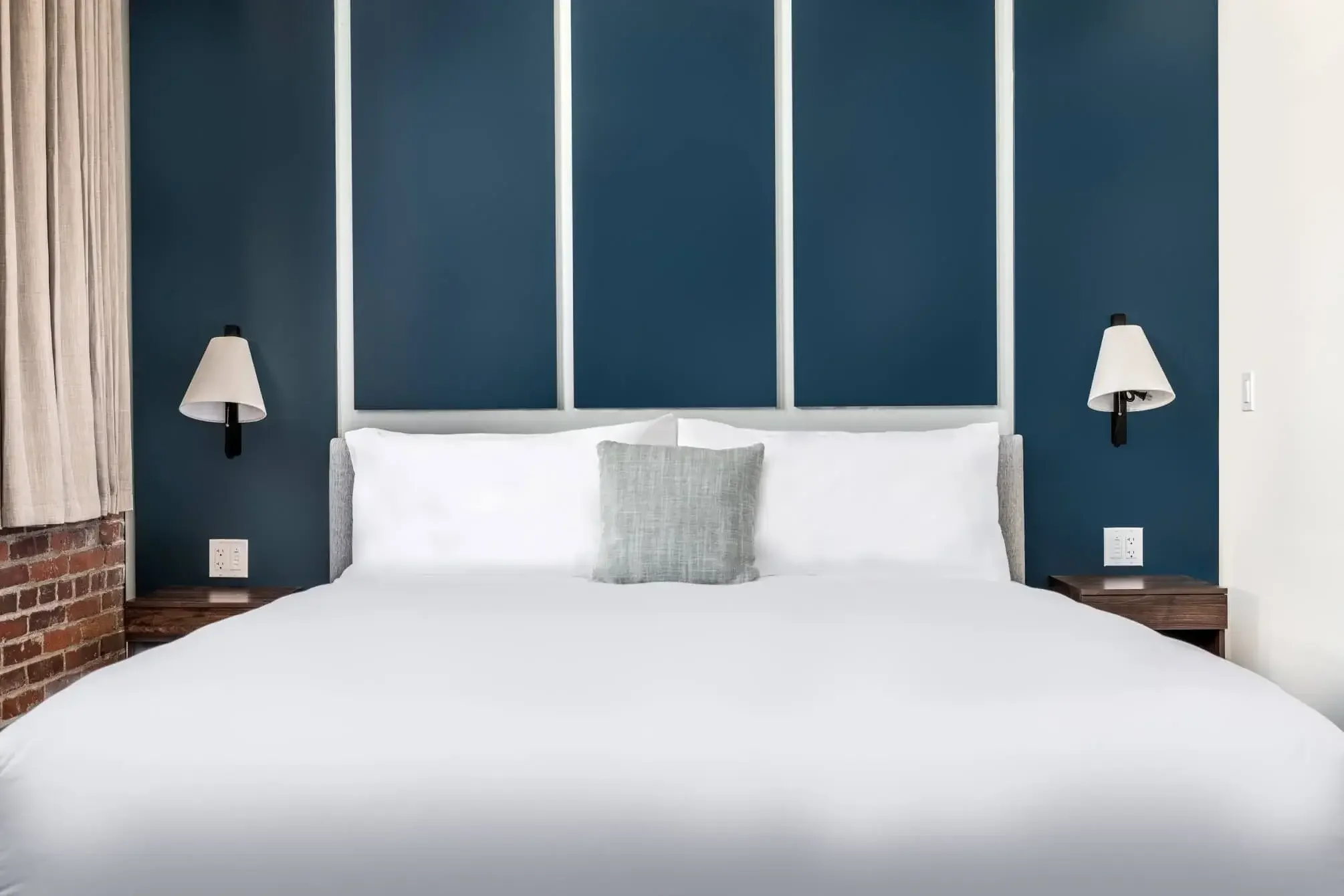 Sleeper sofa and living area with river views at The Skowhegan