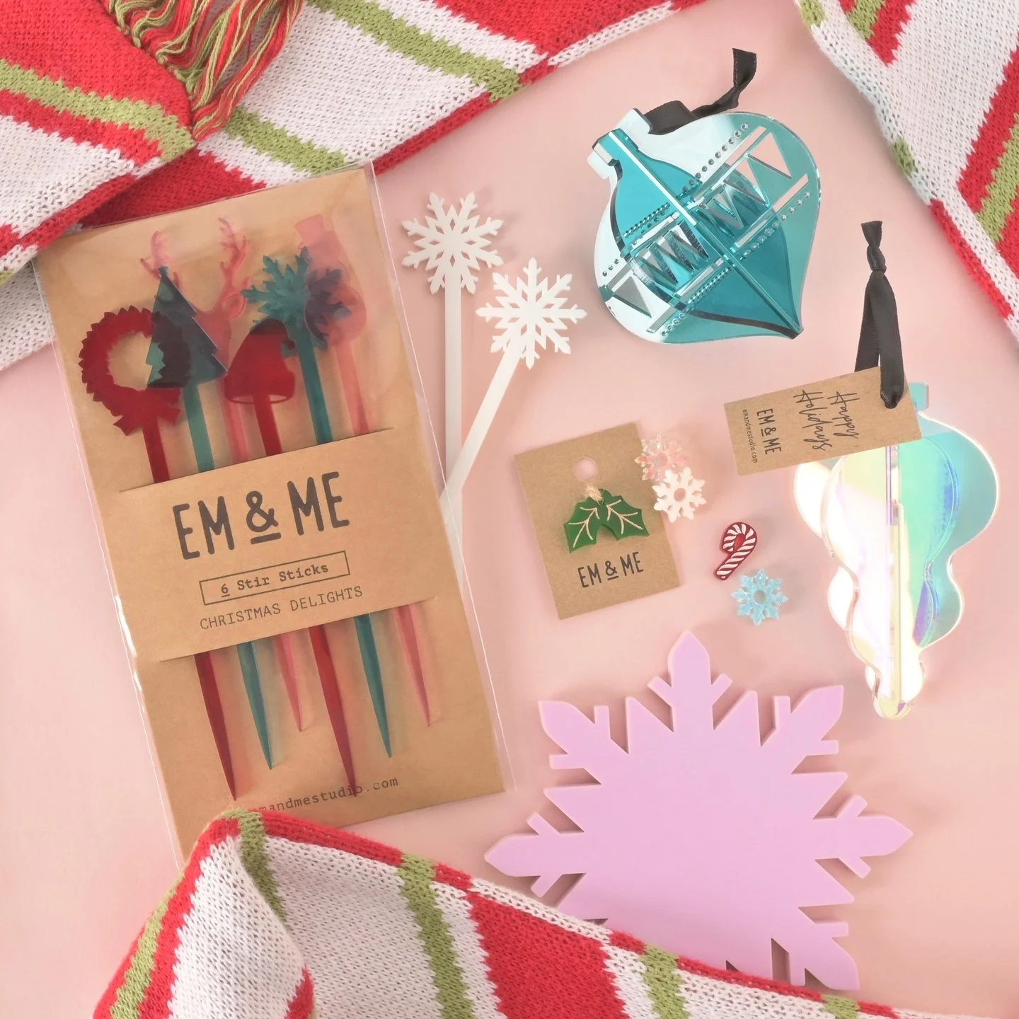 We make more than just pet tags - explore our collection of holiday ornaments, stir sticks, and stylish coasters perfect for gifting. 

Elevate your present game this year with our unique and personalized items. Shop now and make this holiday season 