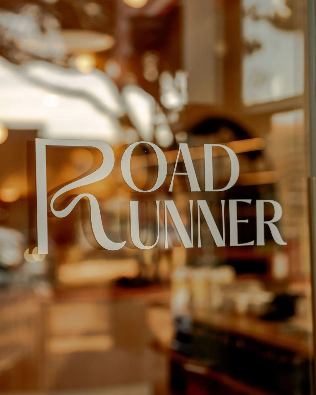 roadrunner logo on glass window