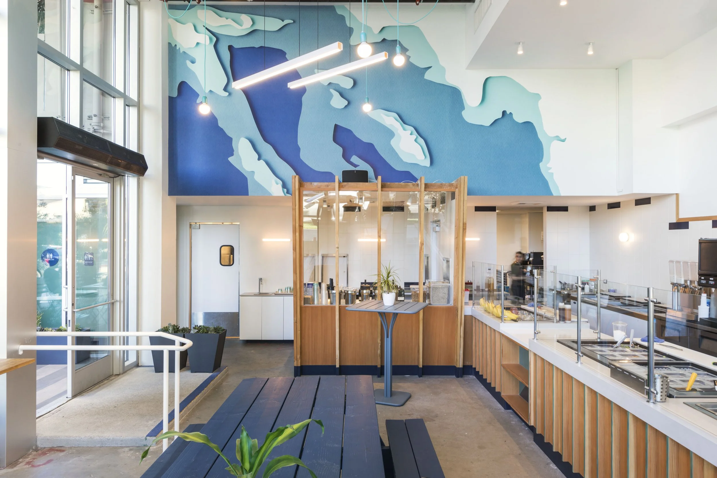 View of ordering counter with pay counter in center 