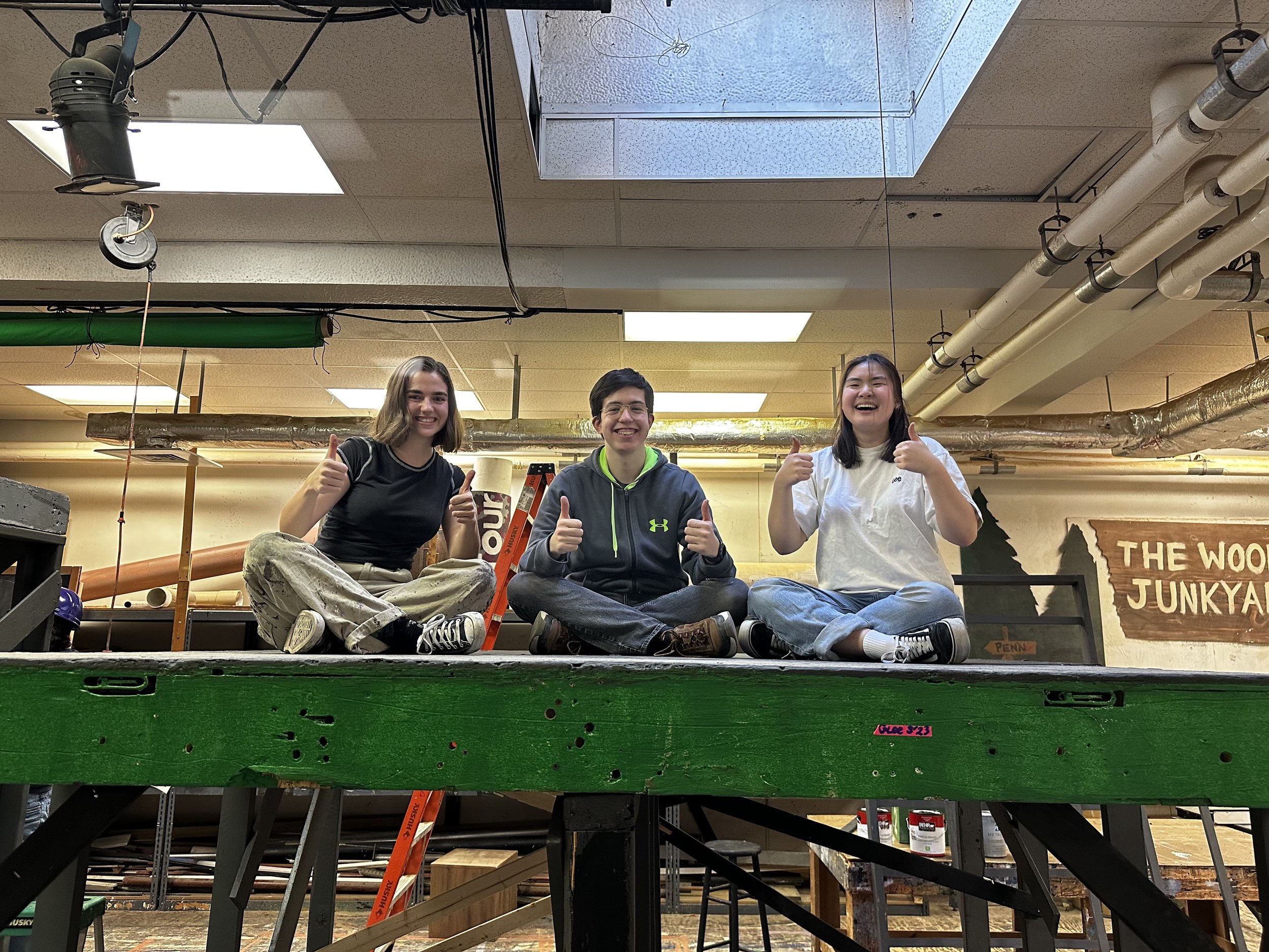 Members of the Penn Glee Club Tech Crew posing atop the Club's 2023 Spring Show set.