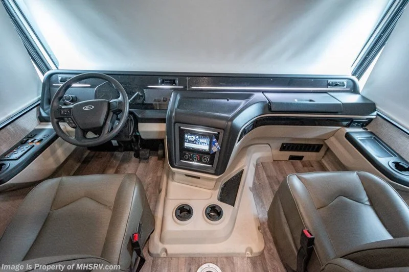 Drivers cab with dash and navigation screen