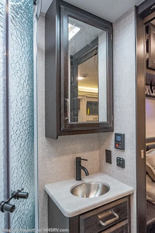 Bathroom sink and medicine cabinet