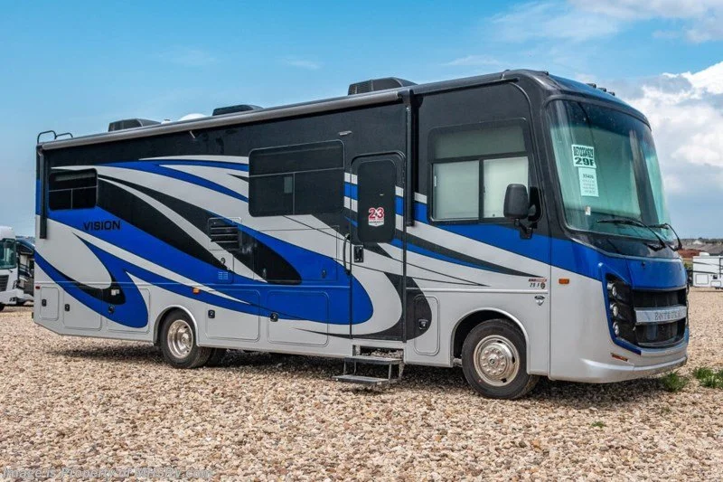 2022 Entegra Vision 29F exterior right side with black, blue, and gray color design